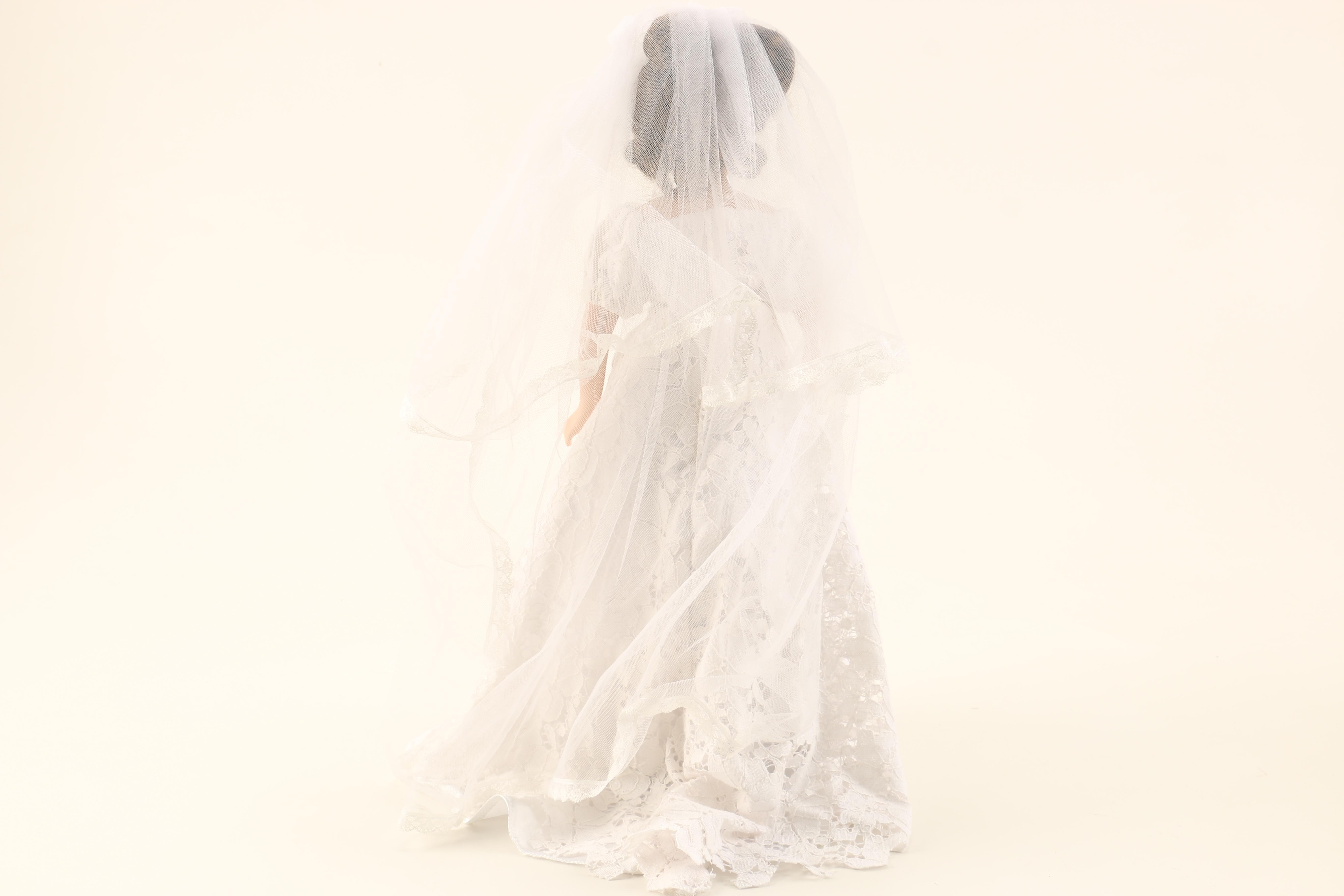 Collection of Three Porcelain Dolls