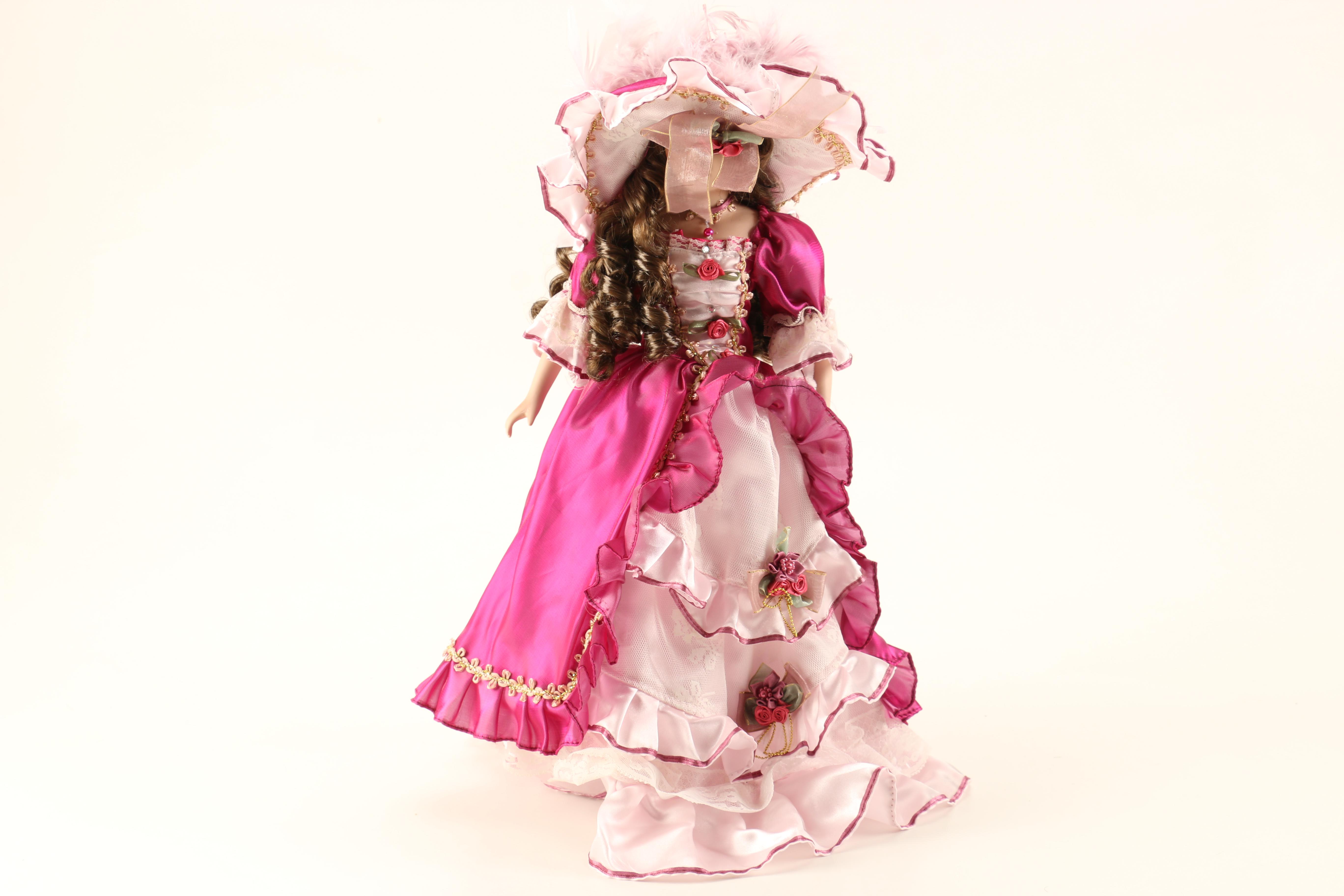 Collection of Three Porcelain Dolls