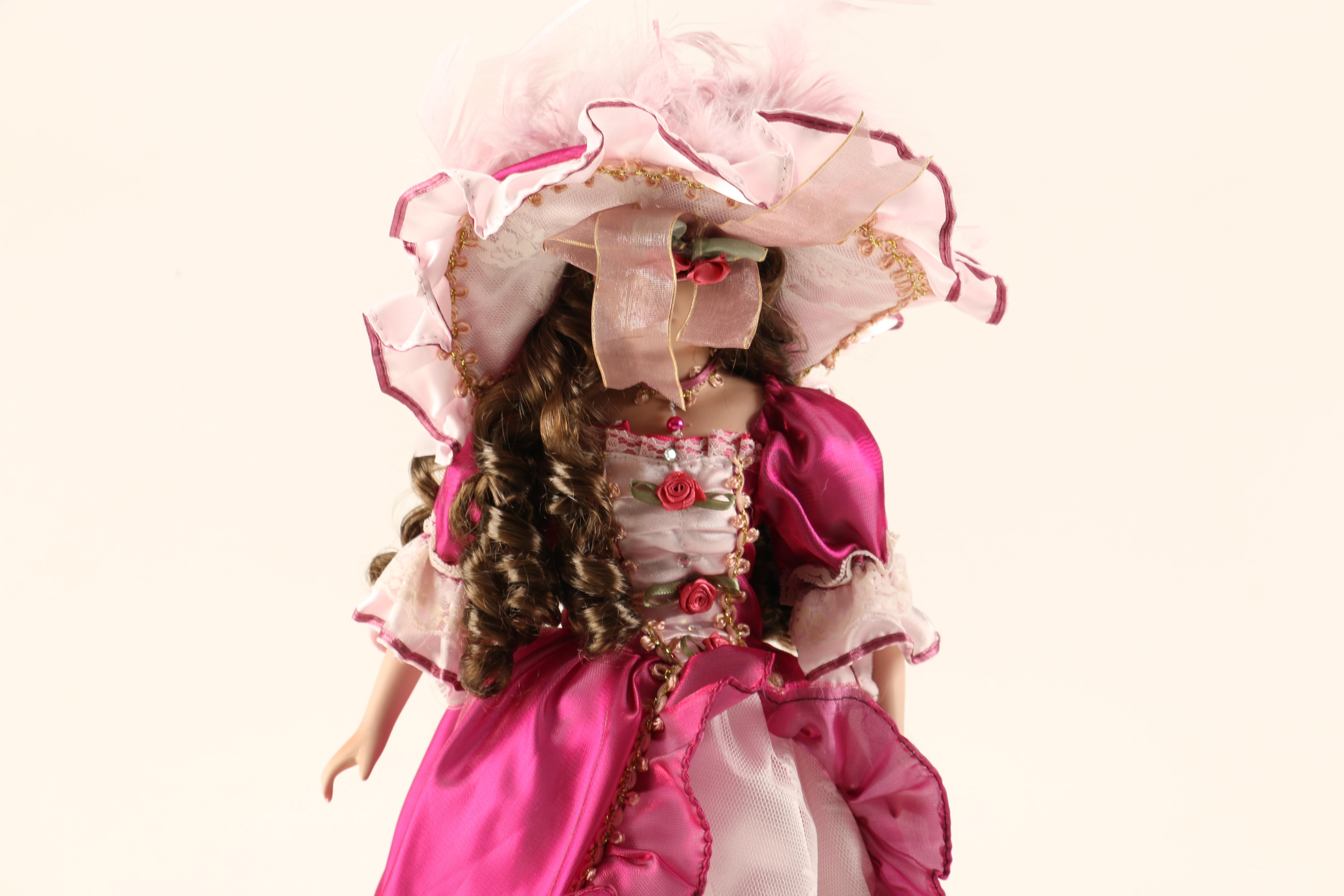 Collection of Three Porcelain Dolls