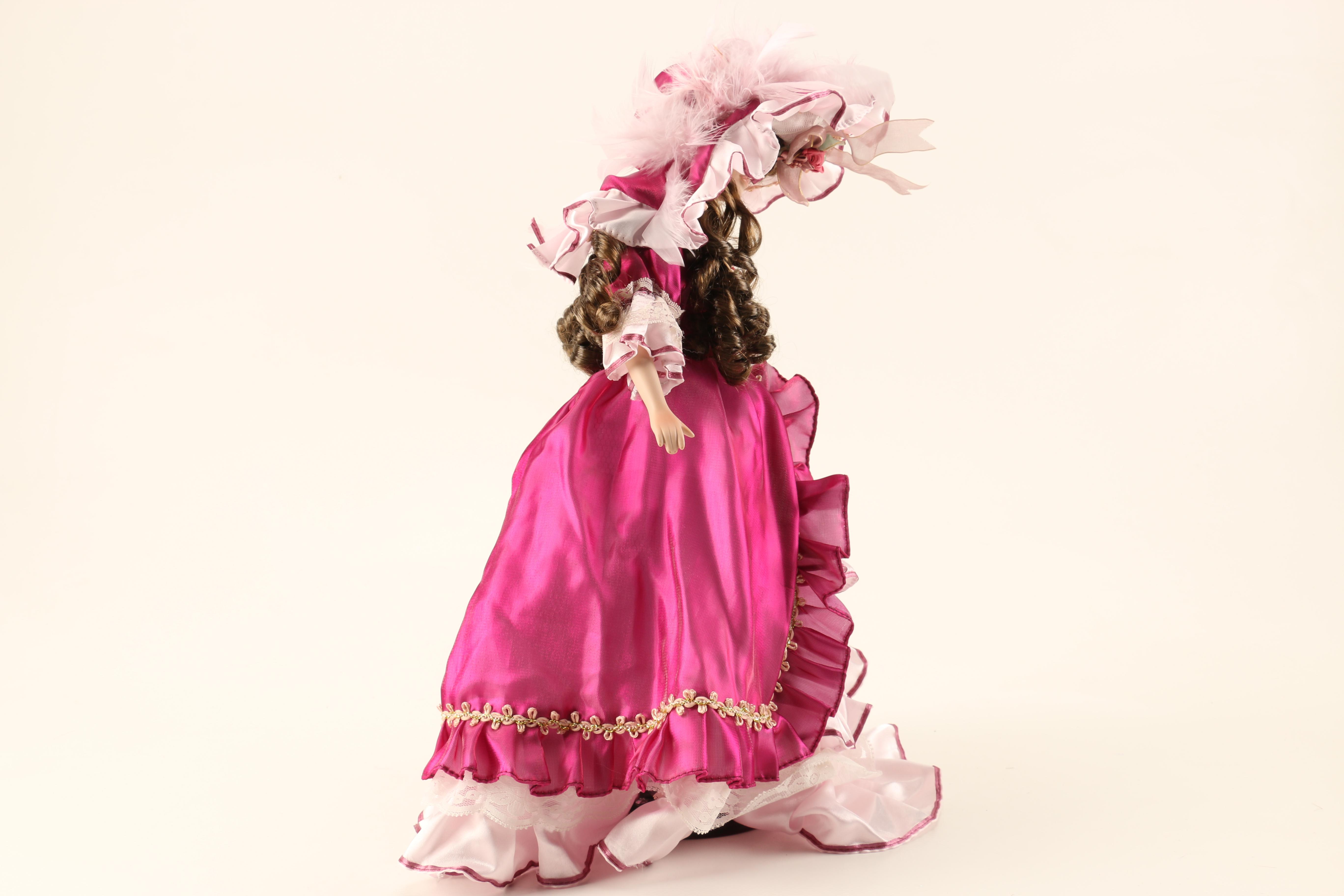 Collection of Three Porcelain Dolls