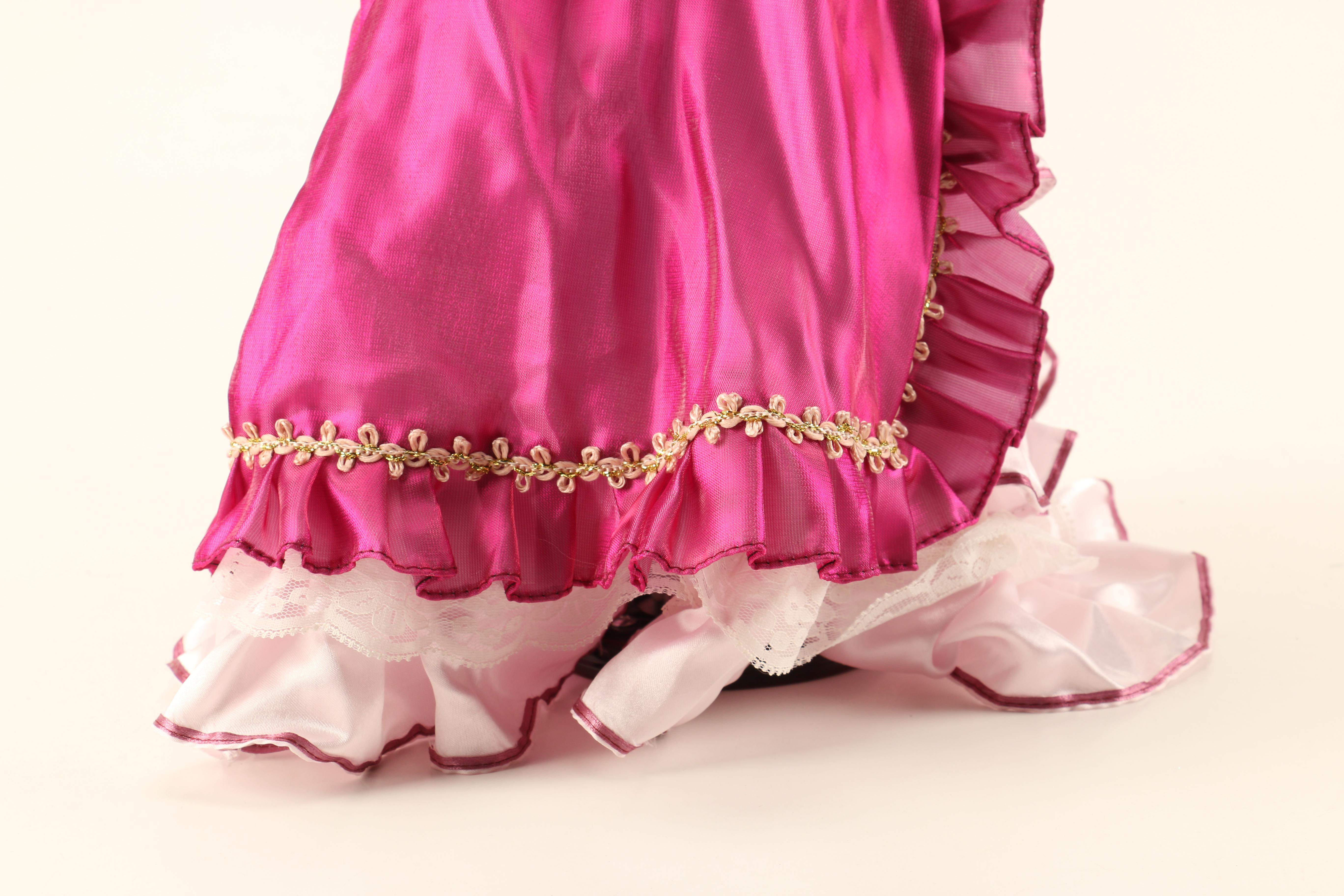 Collection of Three Porcelain Dolls