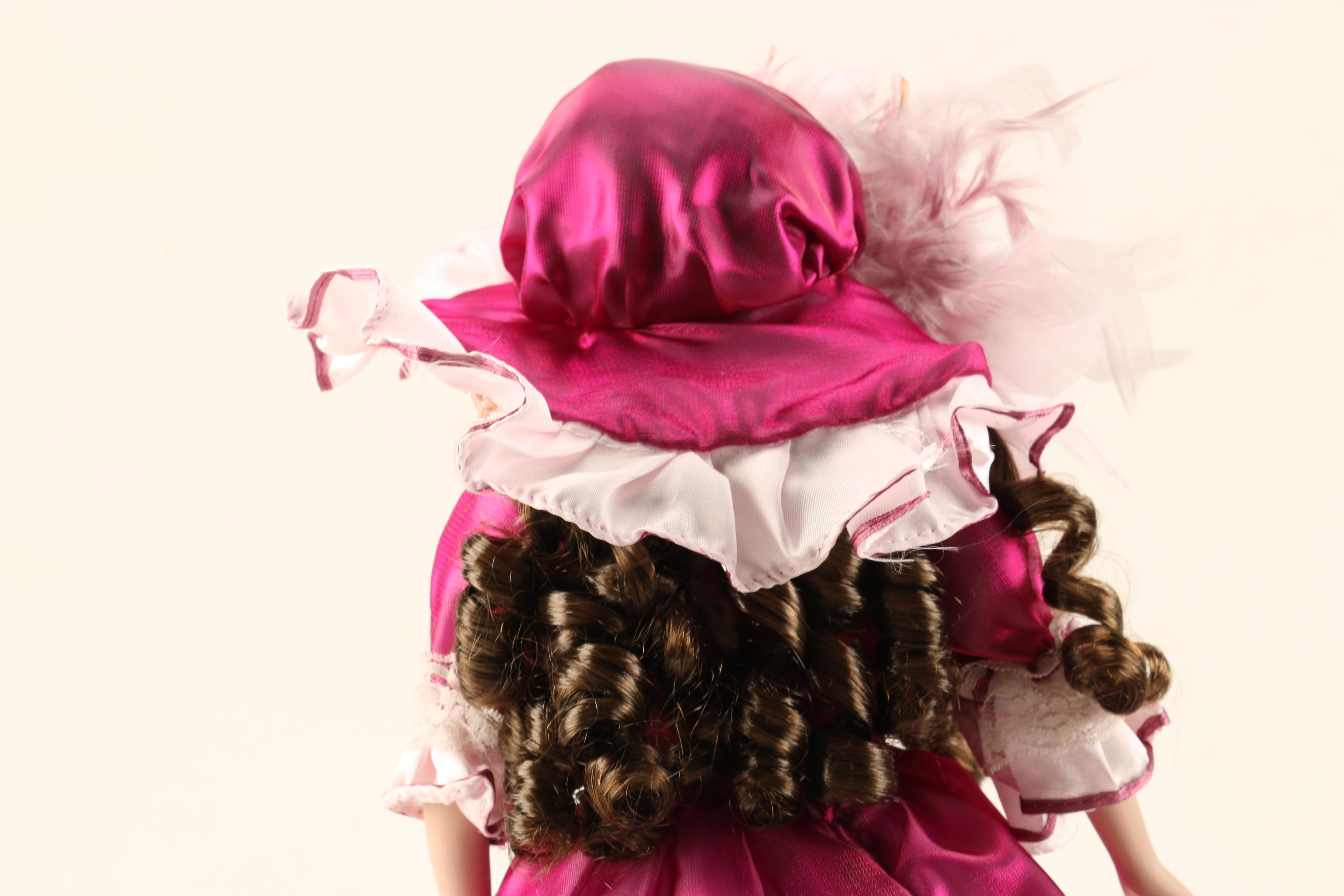 Collection of Three Porcelain Dolls