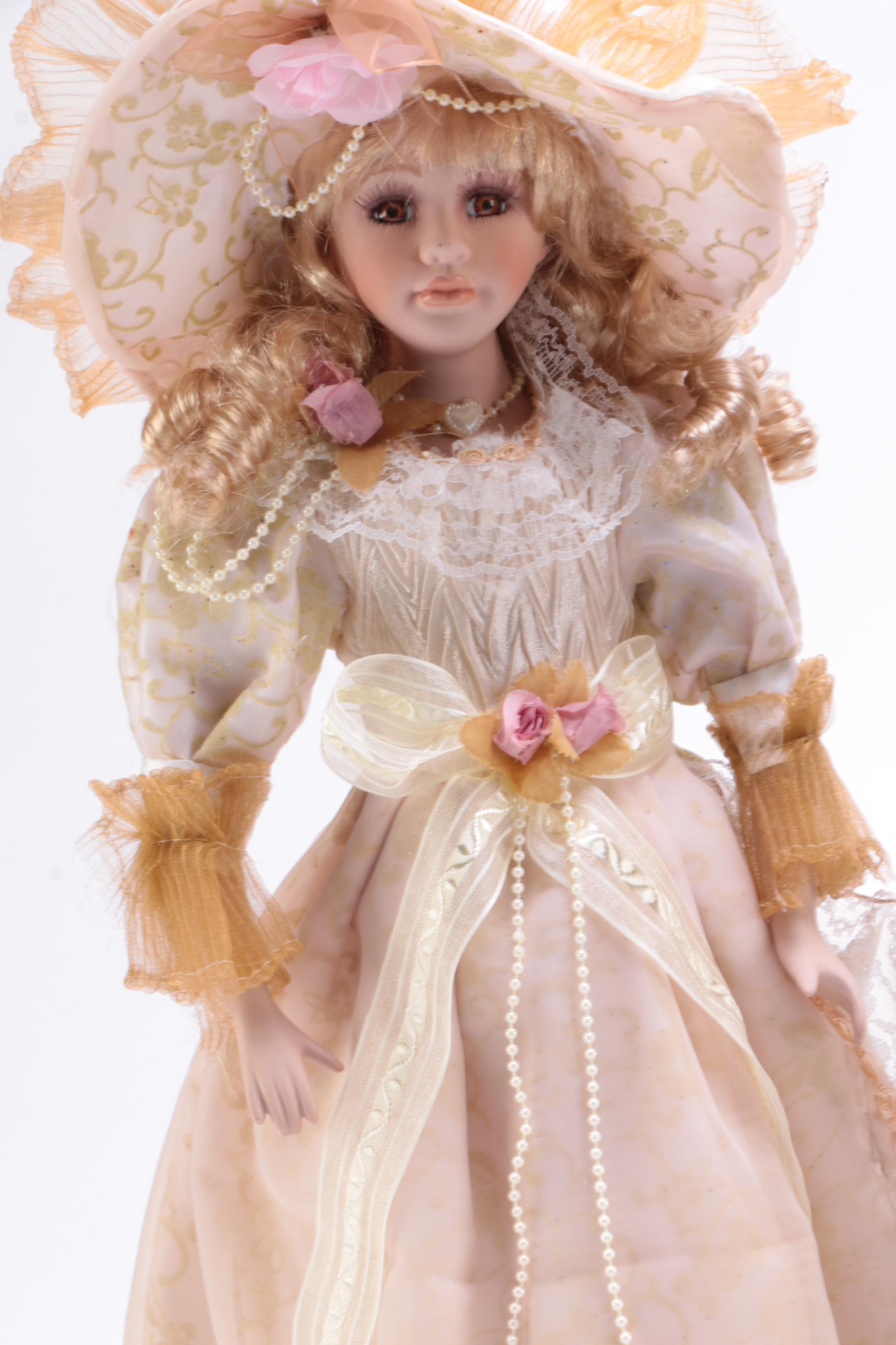 Collection of Three Porcelain Dolls