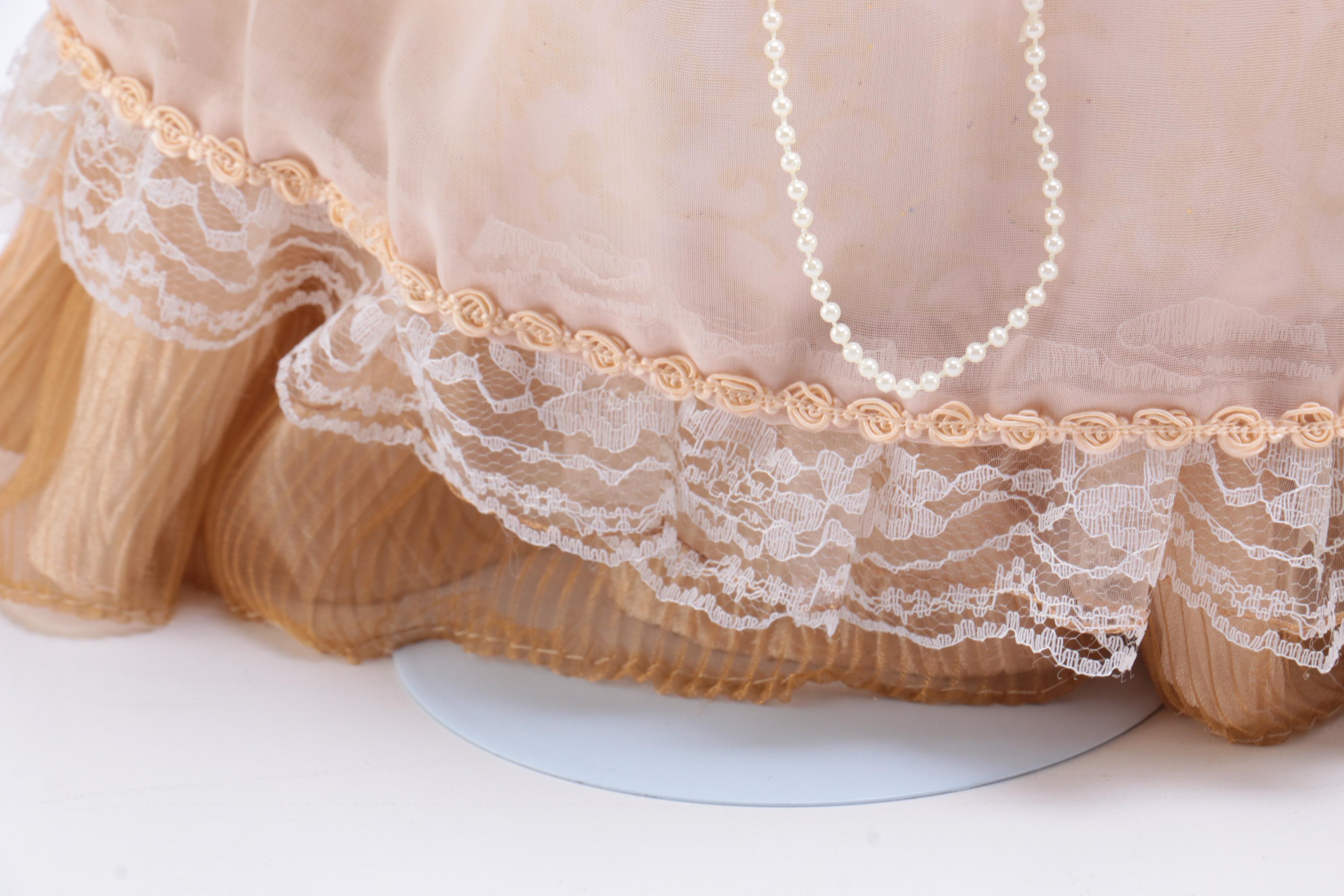 Collection of Three Porcelain Dolls