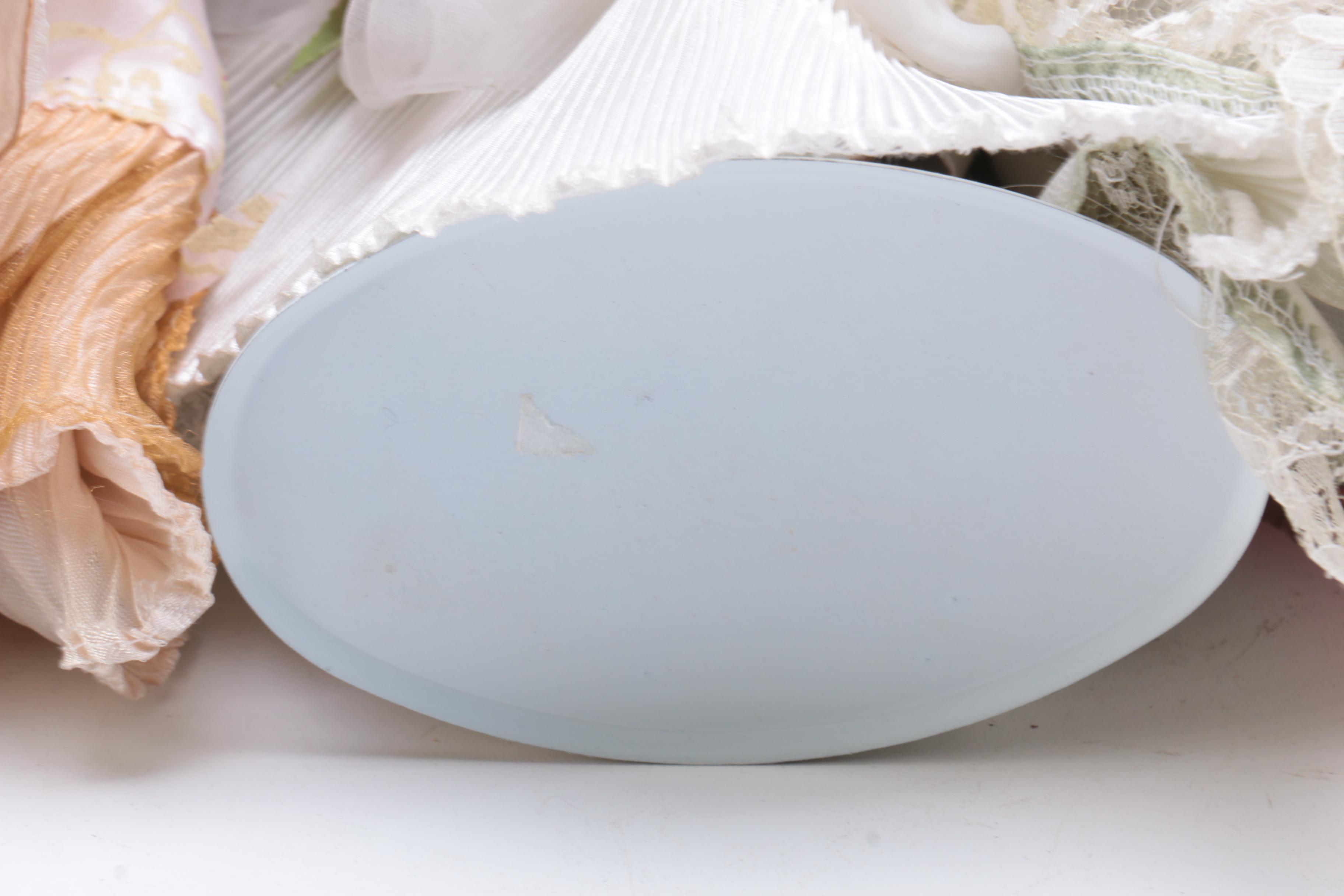 Collection of Three Porcelain Dolls