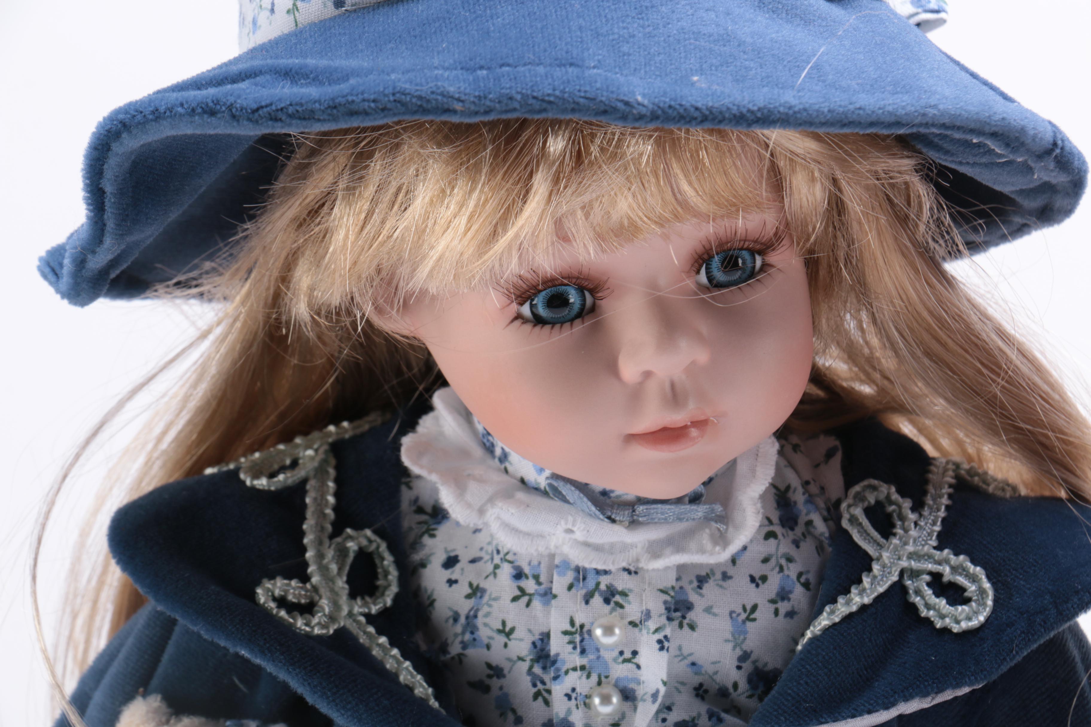 A Pair of Porcelain Dolls