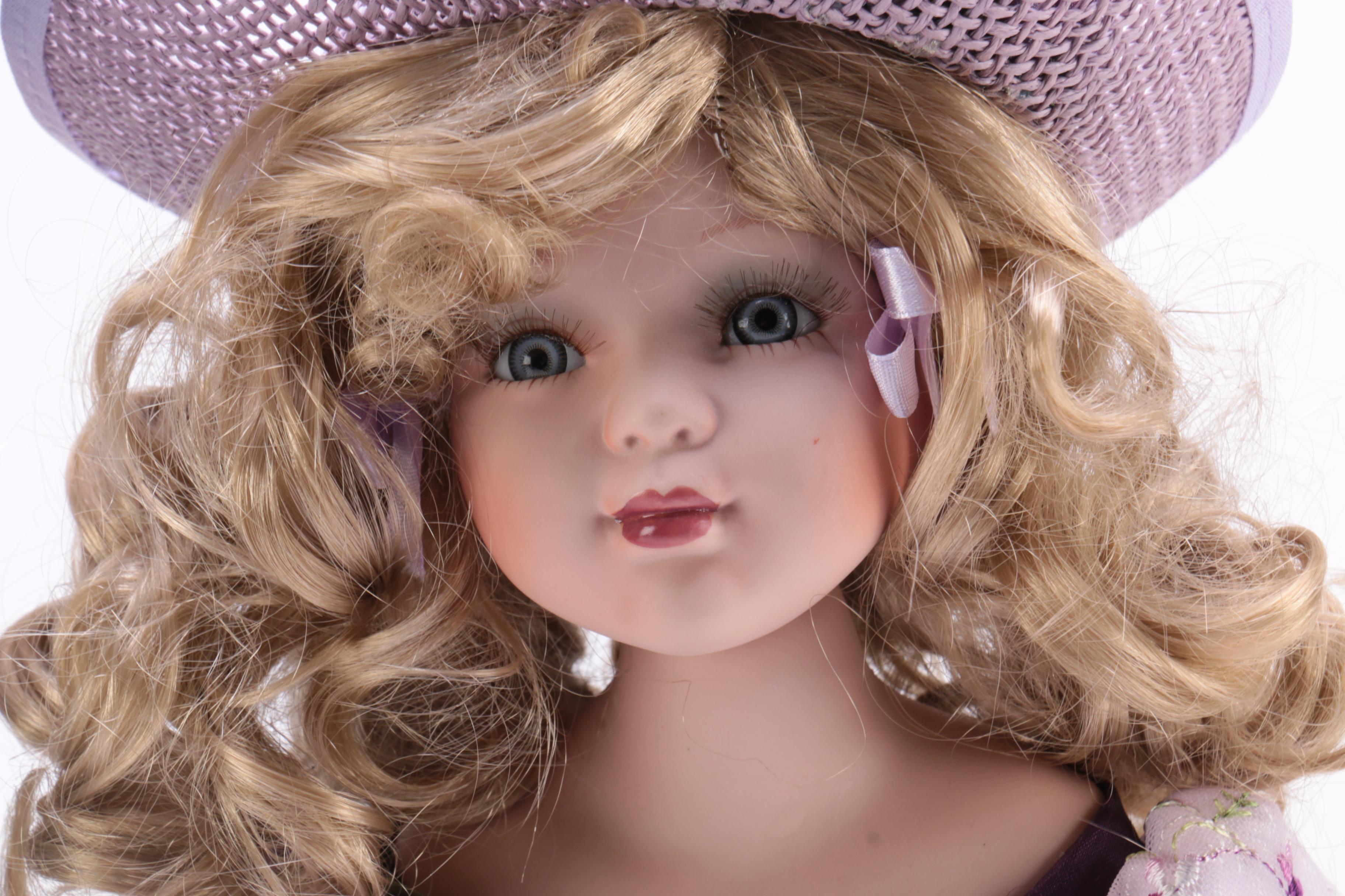 A Pair of Porcelain Dolls