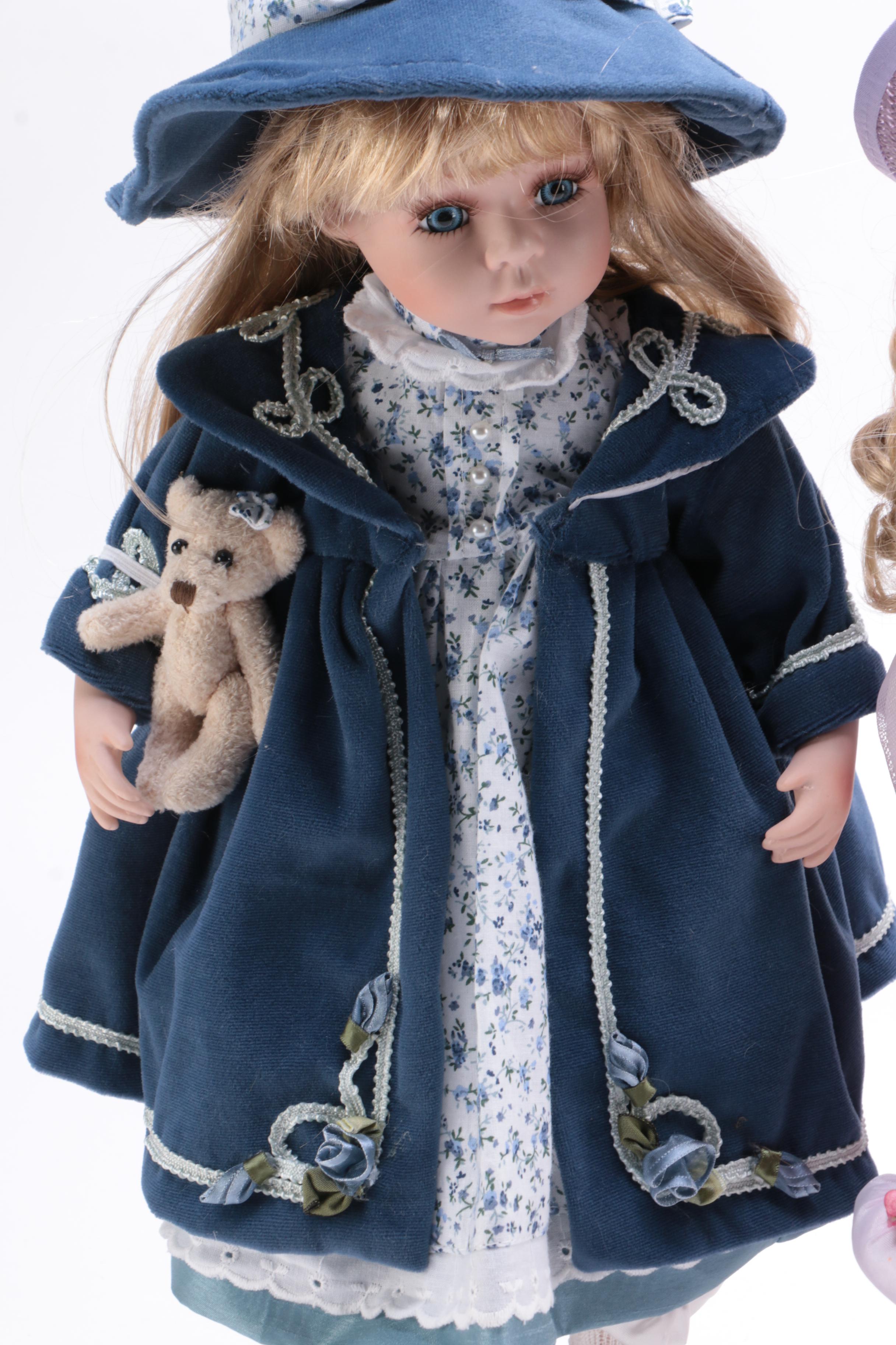 A Pair of Porcelain Dolls