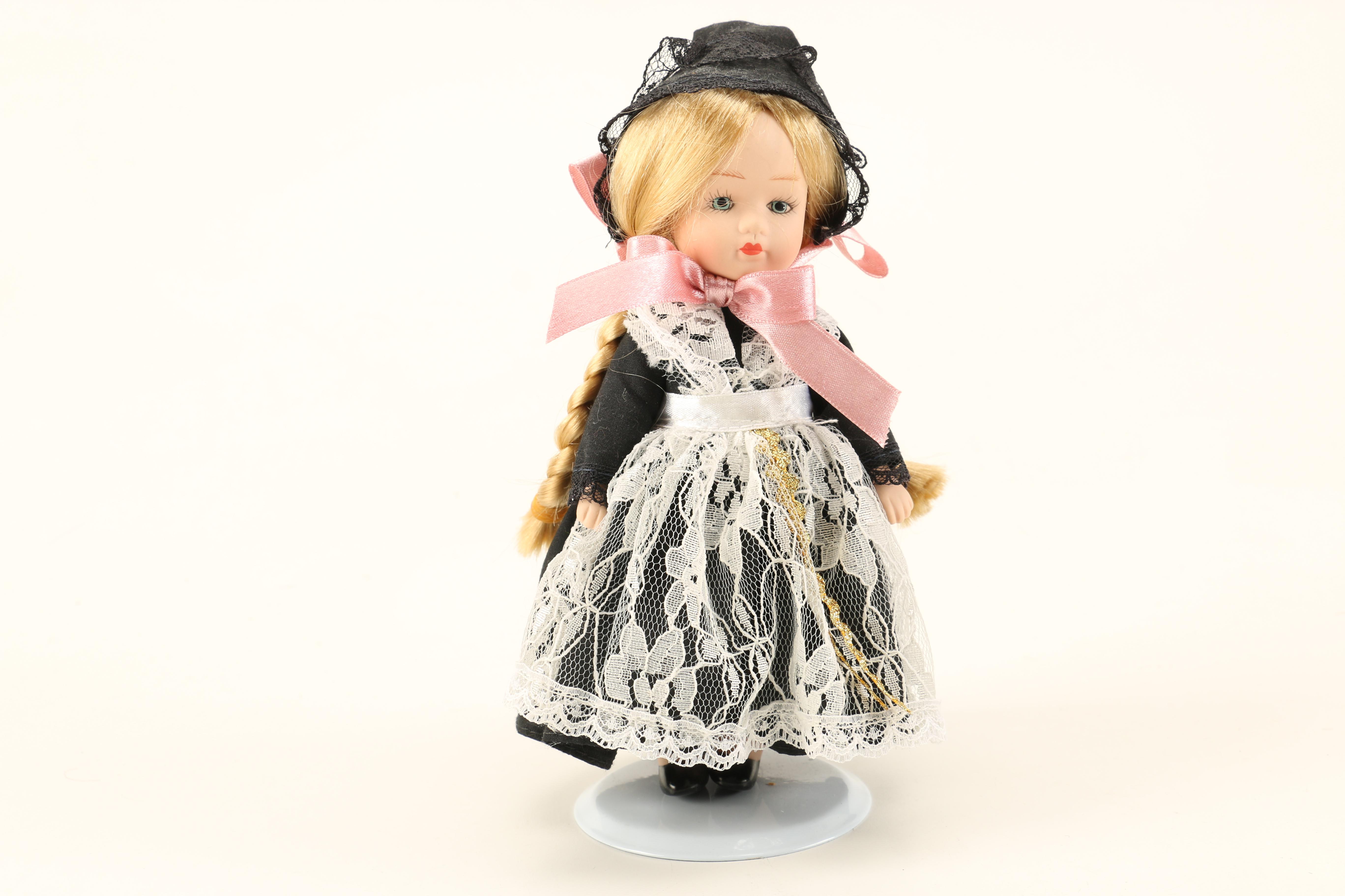 Assortment of Porcelain Dolls including Madame Alexander