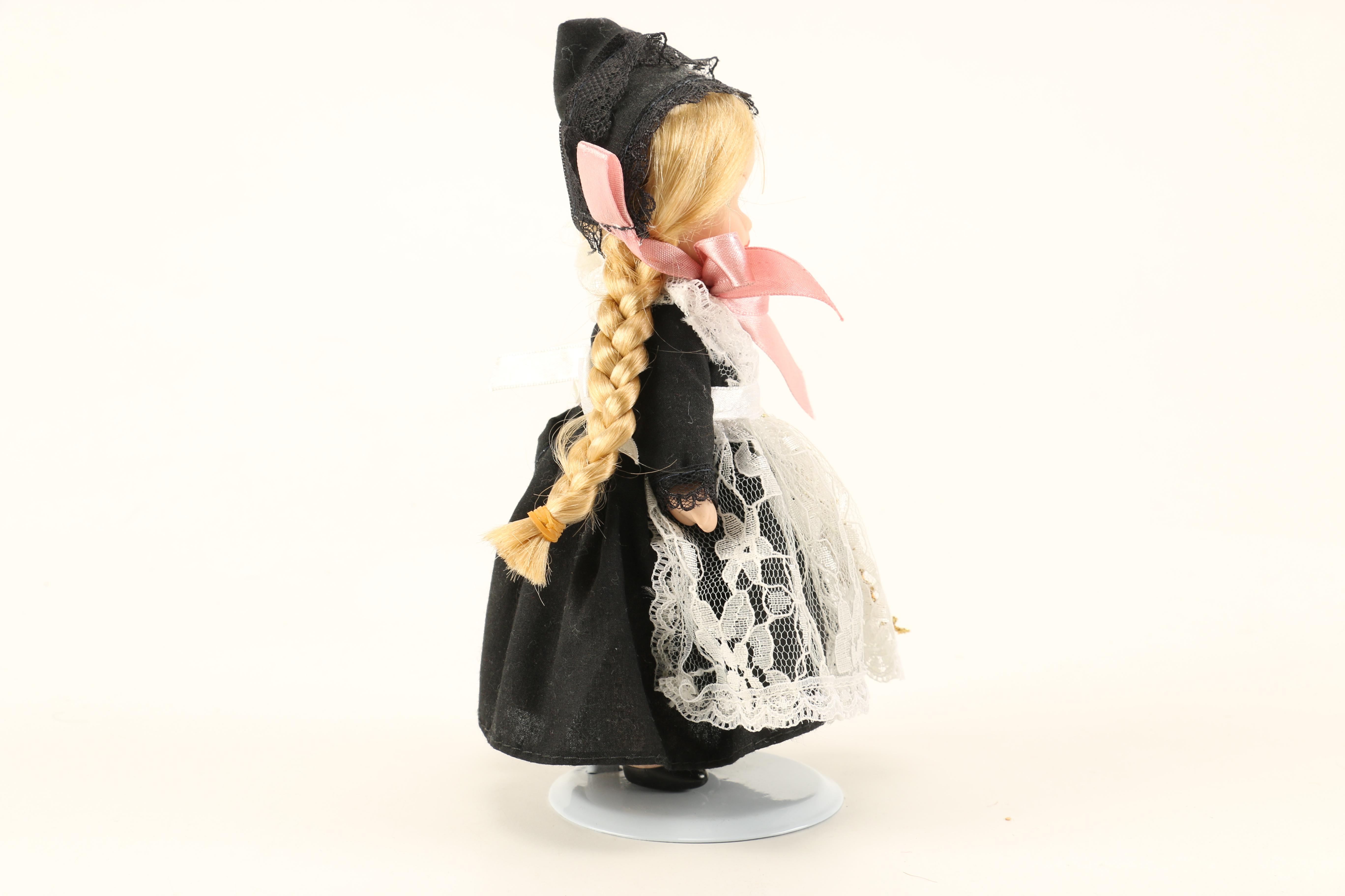 Assortment of Porcelain Dolls including Madame Alexander