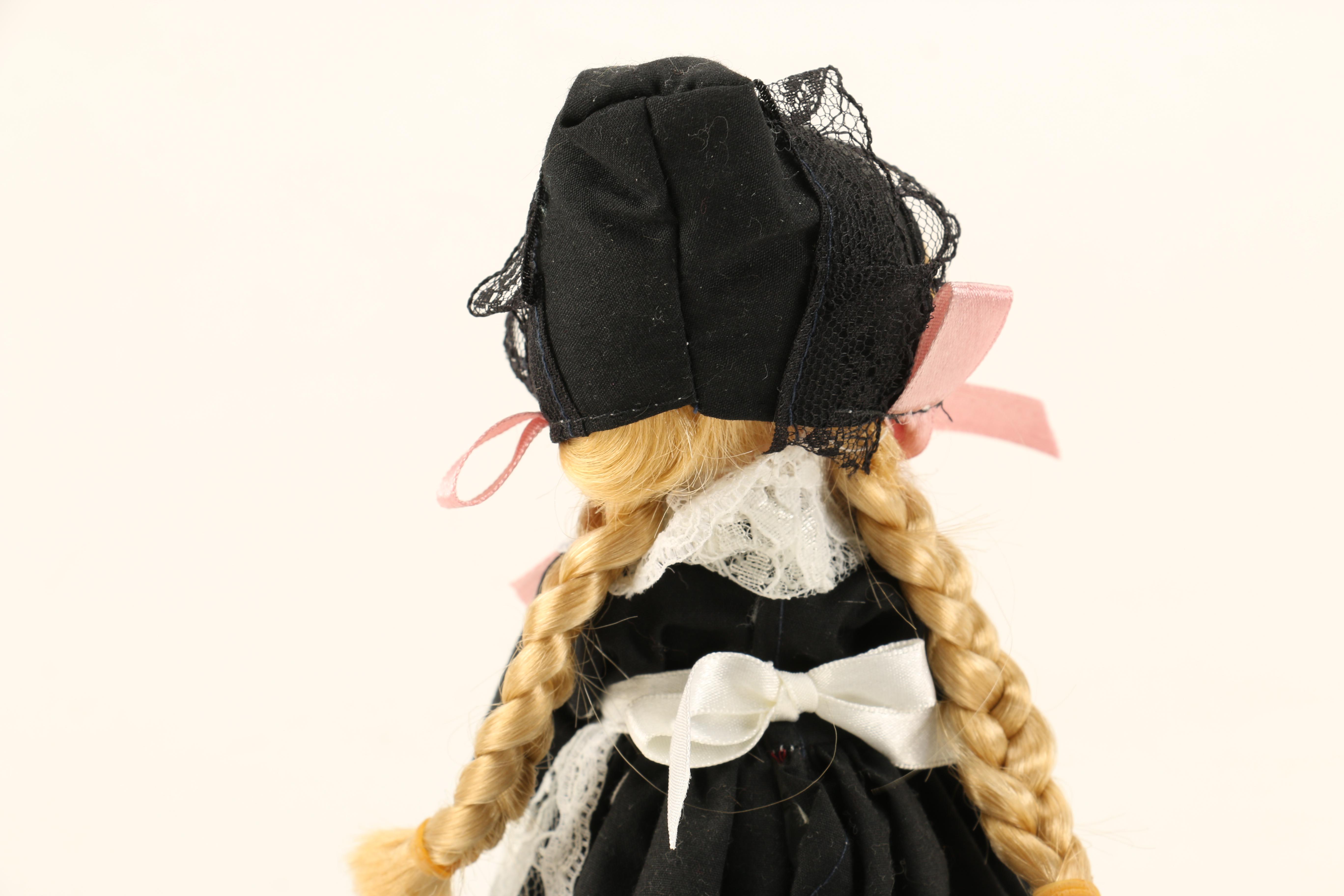 Assortment of Porcelain Dolls including Madame Alexander