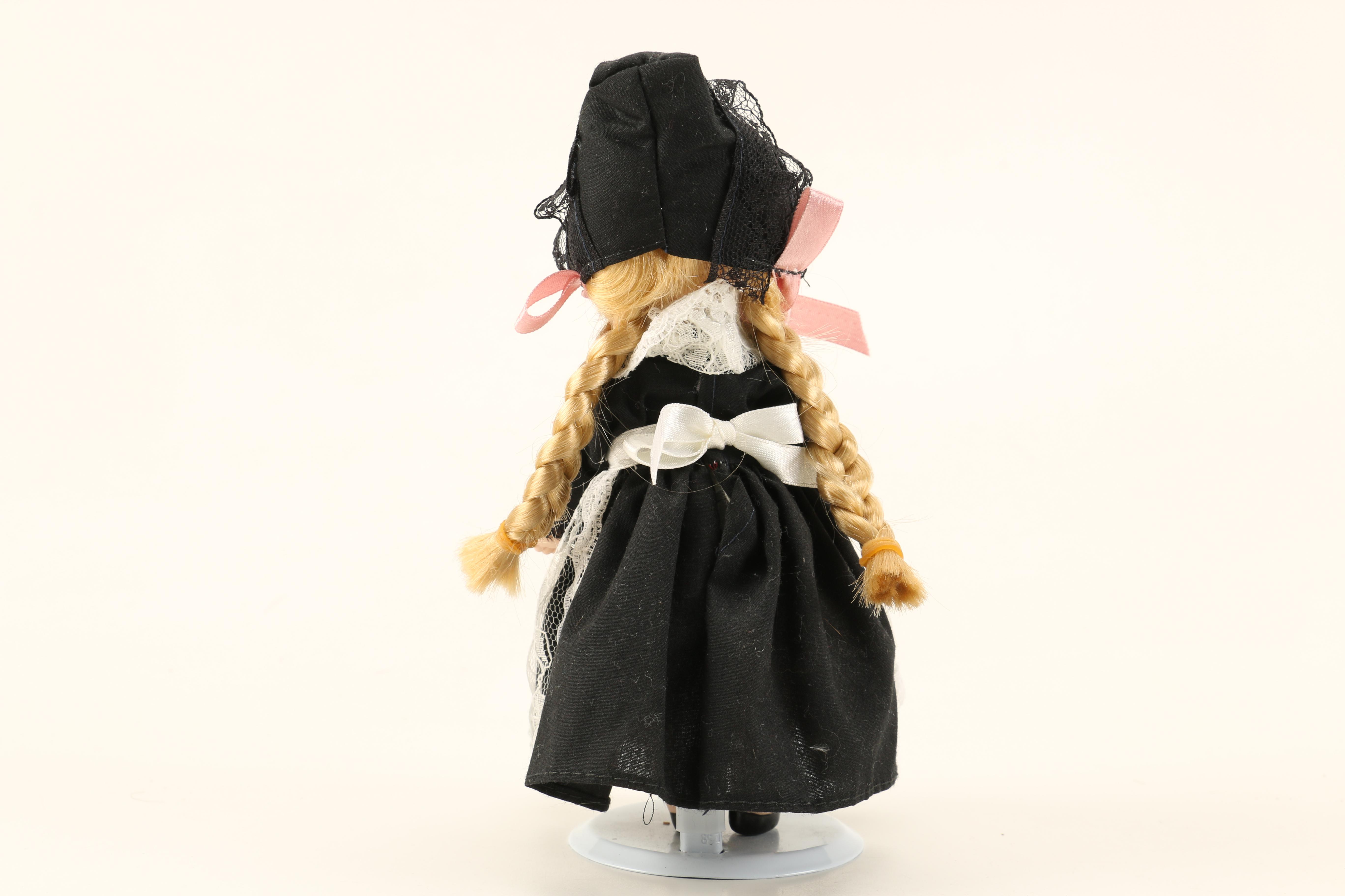 Assortment of Porcelain Dolls including Madame Alexander