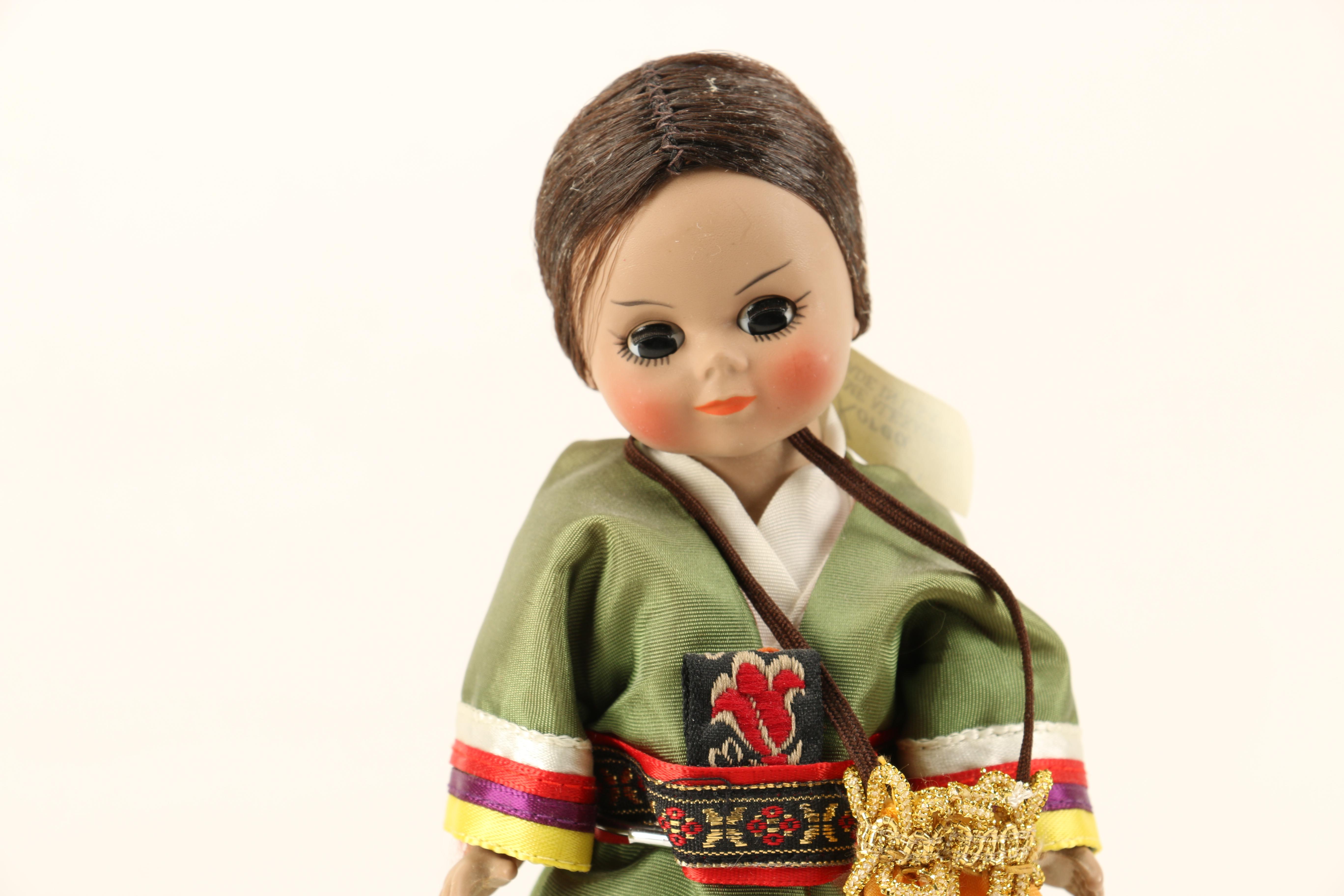 Assortment of Porcelain Dolls including Madame Alexander