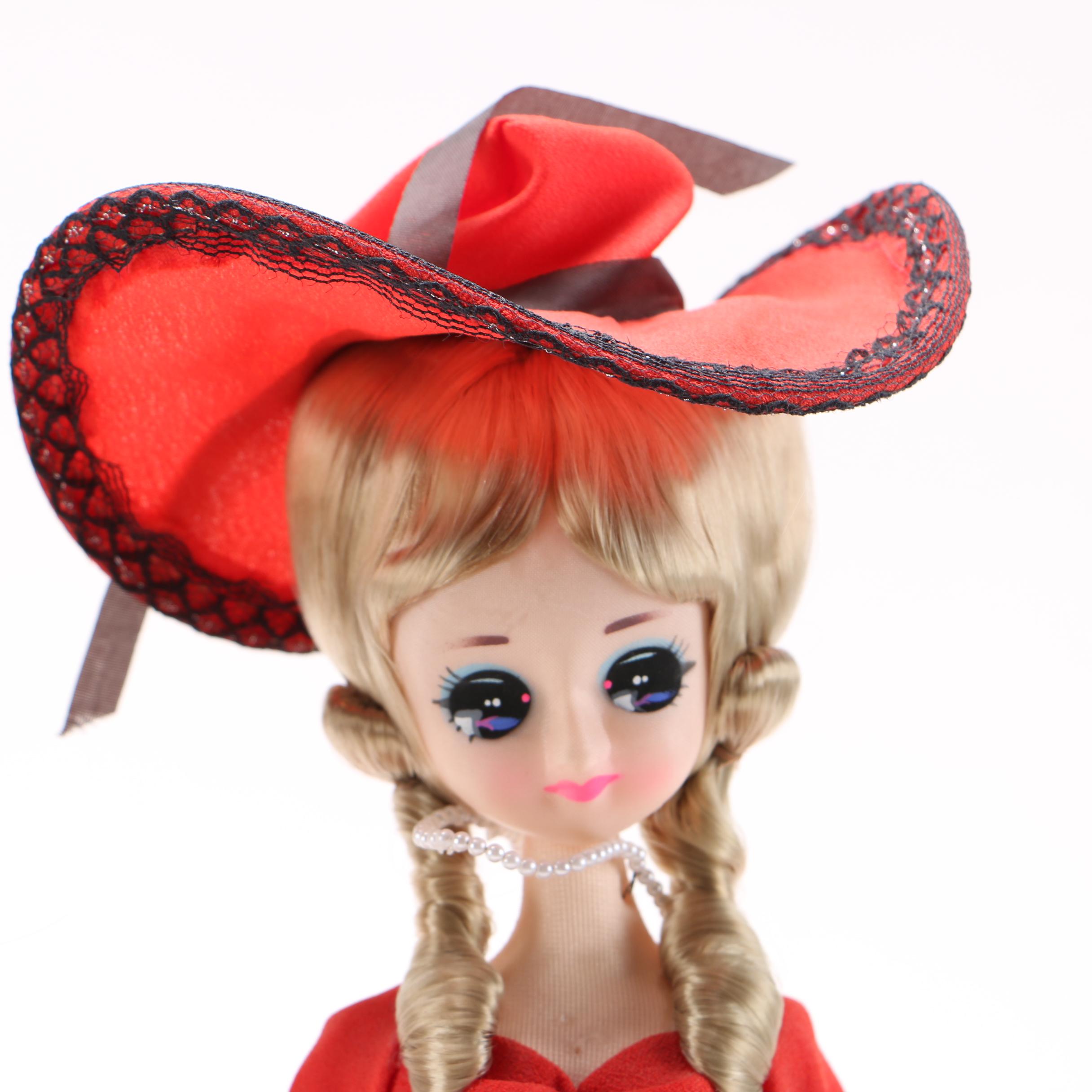 Porcelain Doll and Vintage Big Eyed Vinyl and Cloth Doll