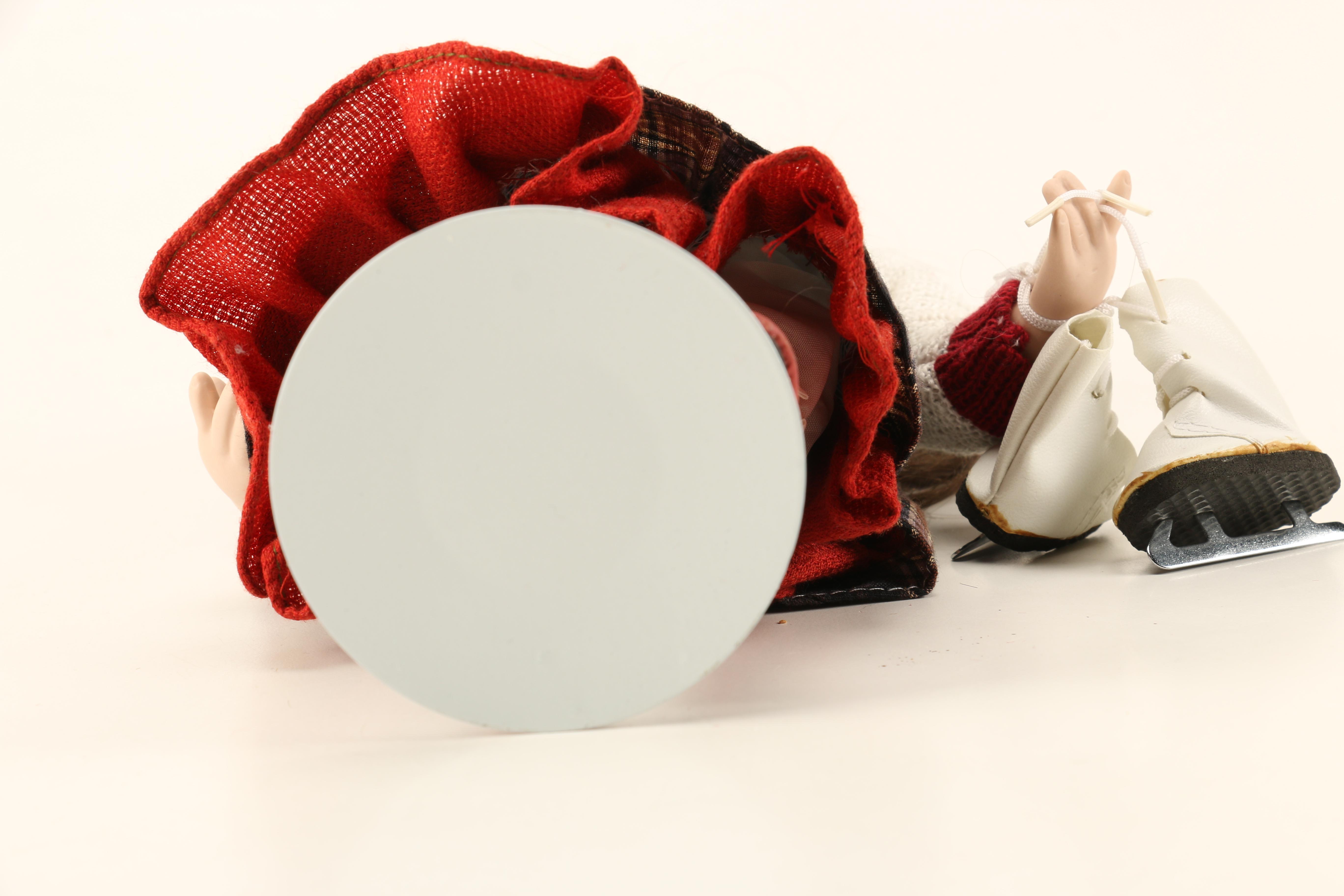 Pair of Porcleain Ice Skater Dolls