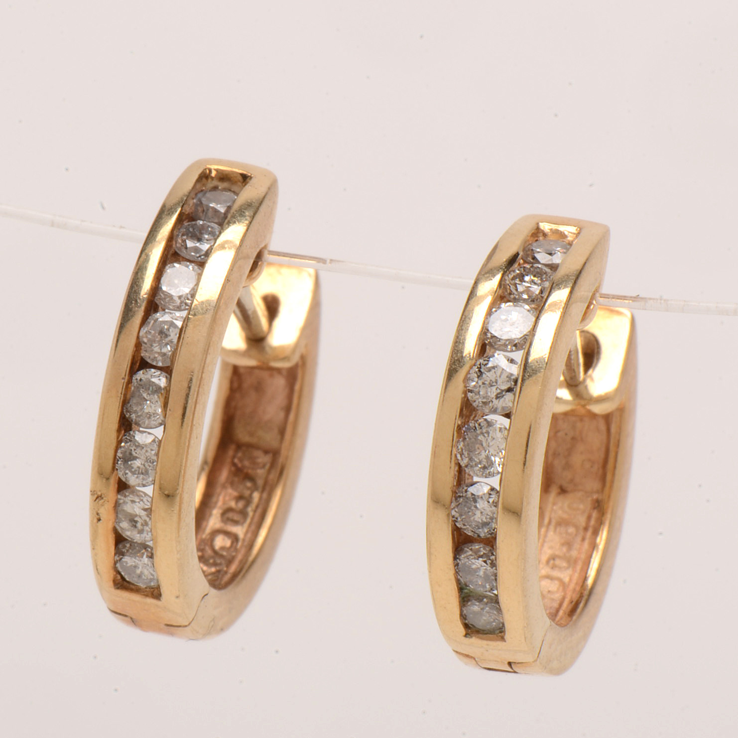 Pair of 10K Yellow Gold Diamond Huggie Hoop Earrings