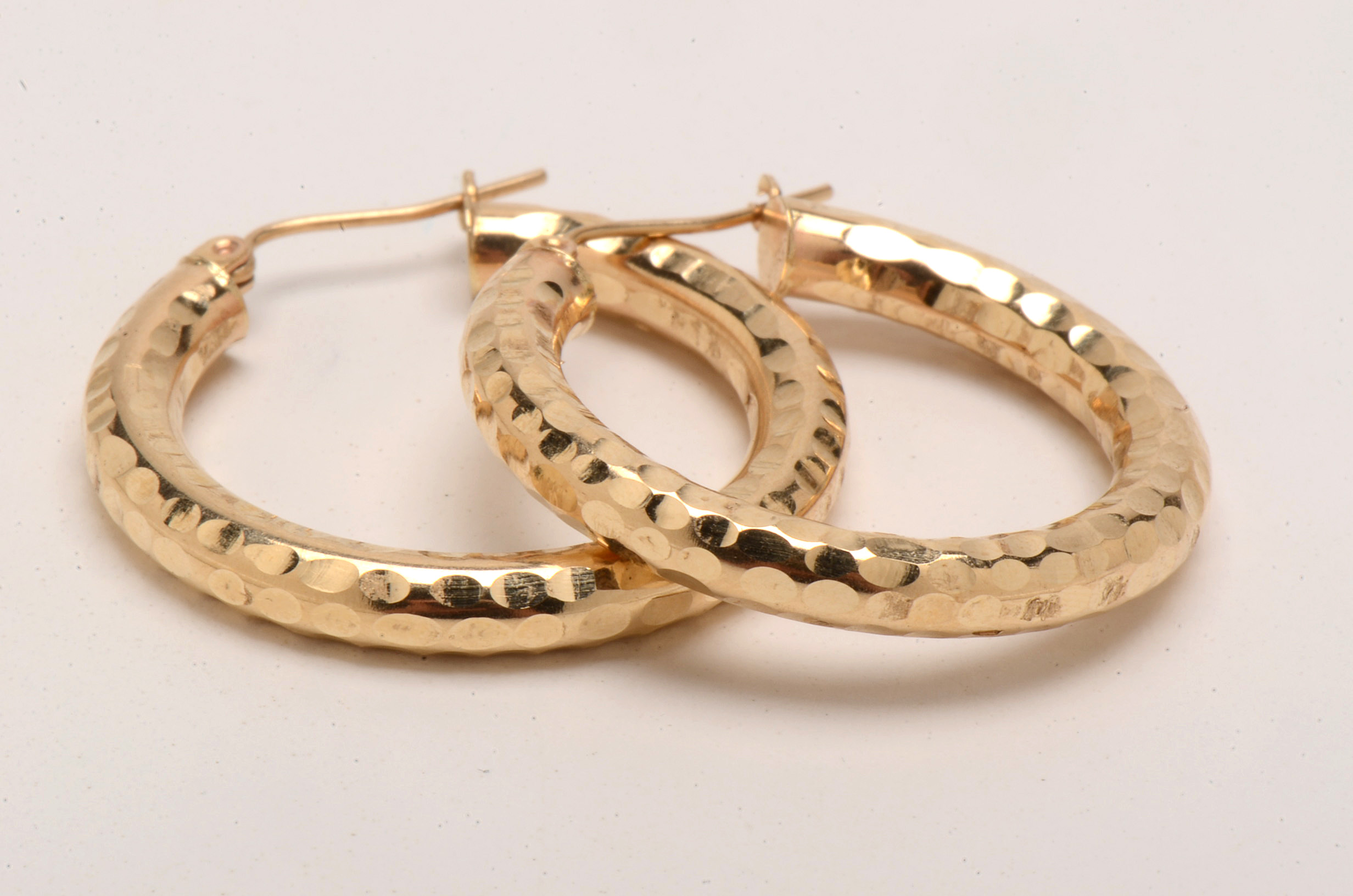 Pair of 14K Yellow Gold Hammered, Tubular Hoop Earrings