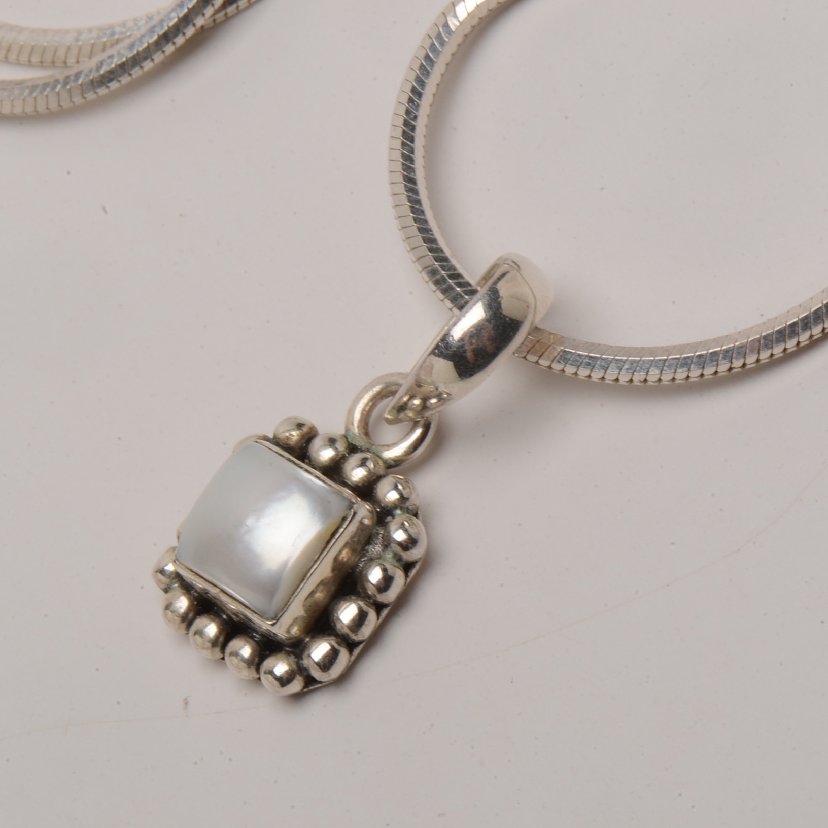 Group of Three Sterling Silver Necklaces with Pendants