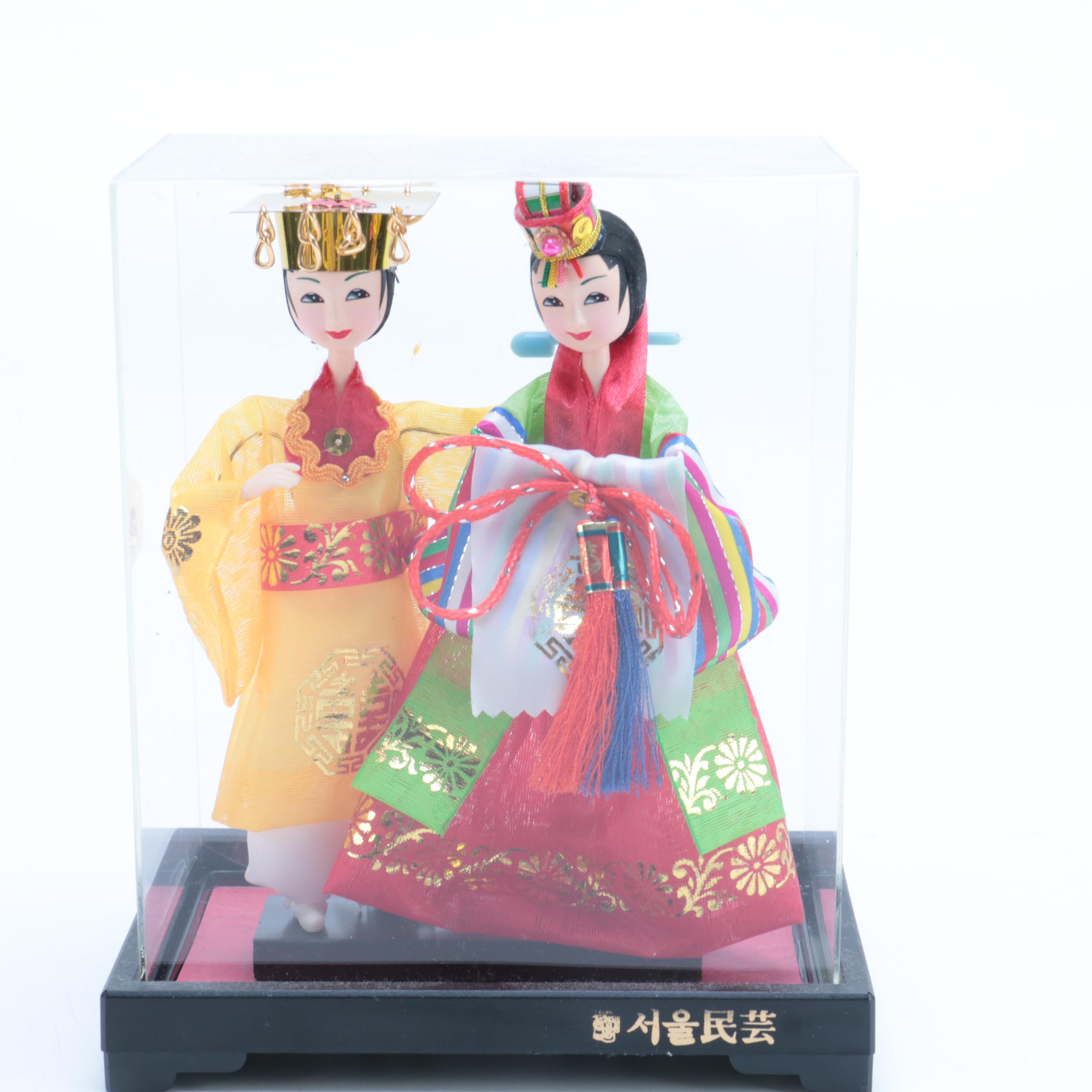 Collection of Four Asian Dolls