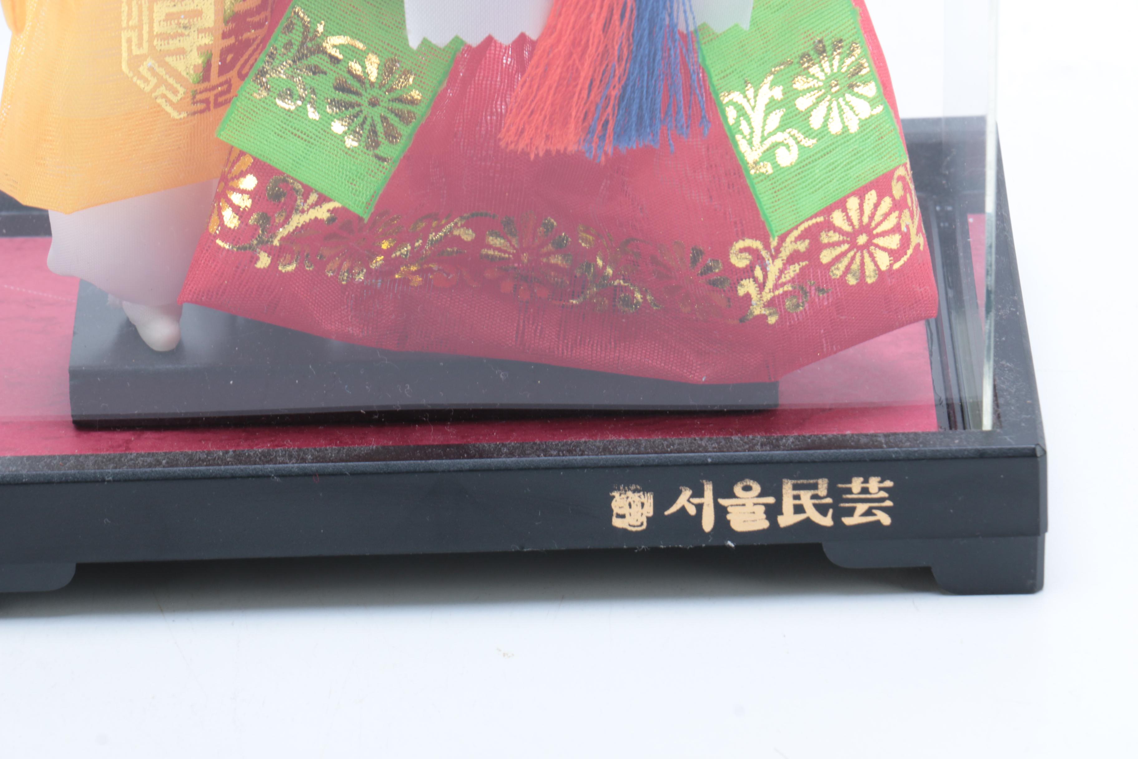 Collection of Four Asian Dolls