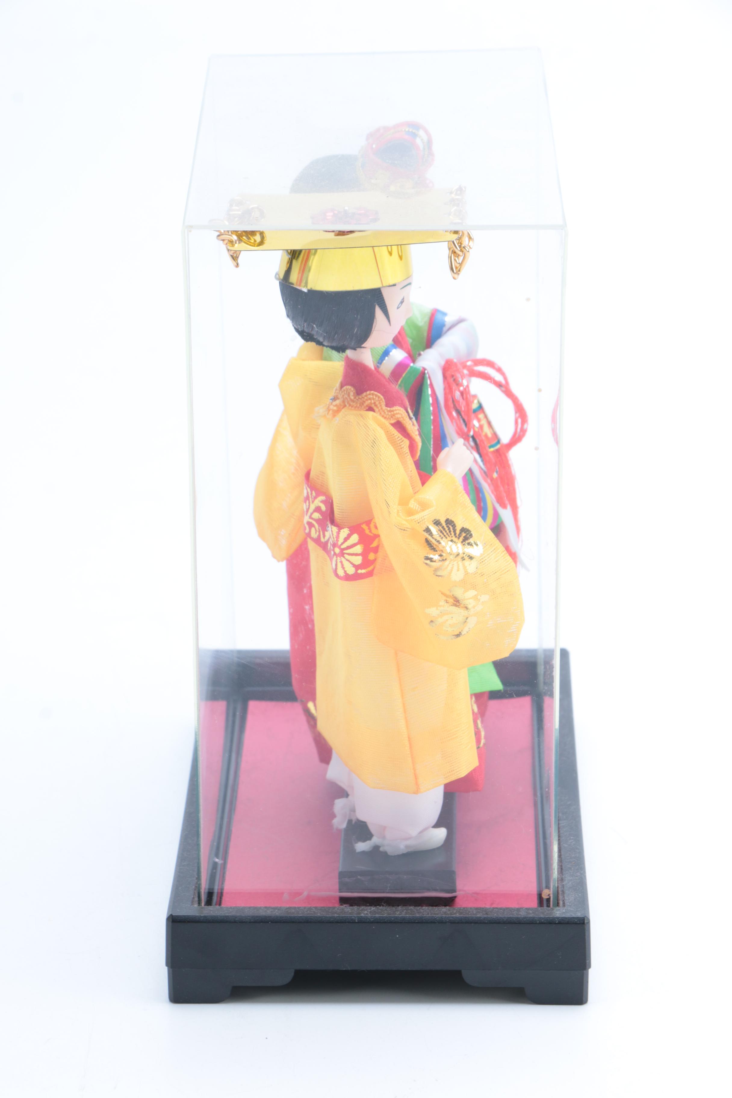 Collection of Four Asian Dolls