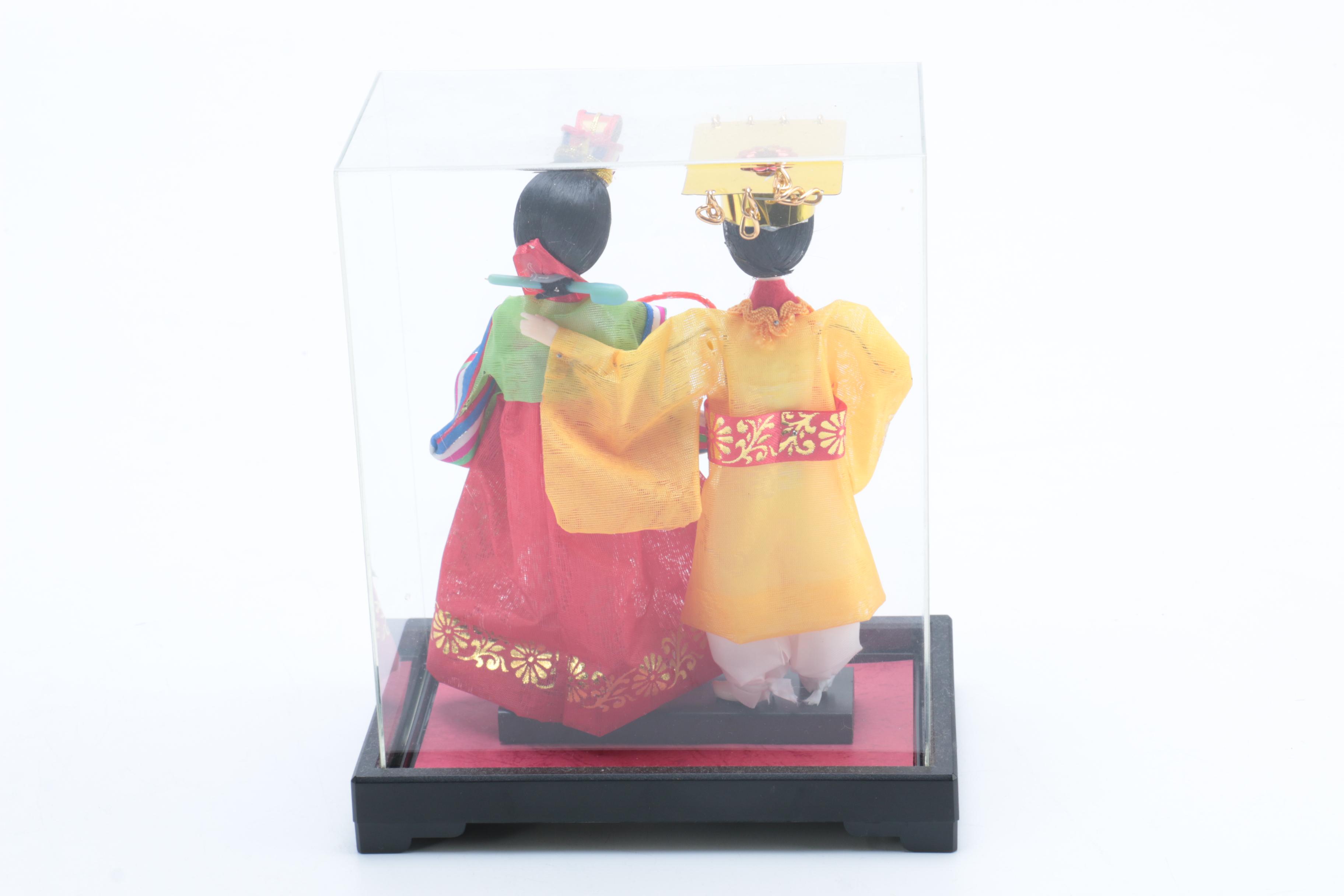 Collection of Four Asian Dolls