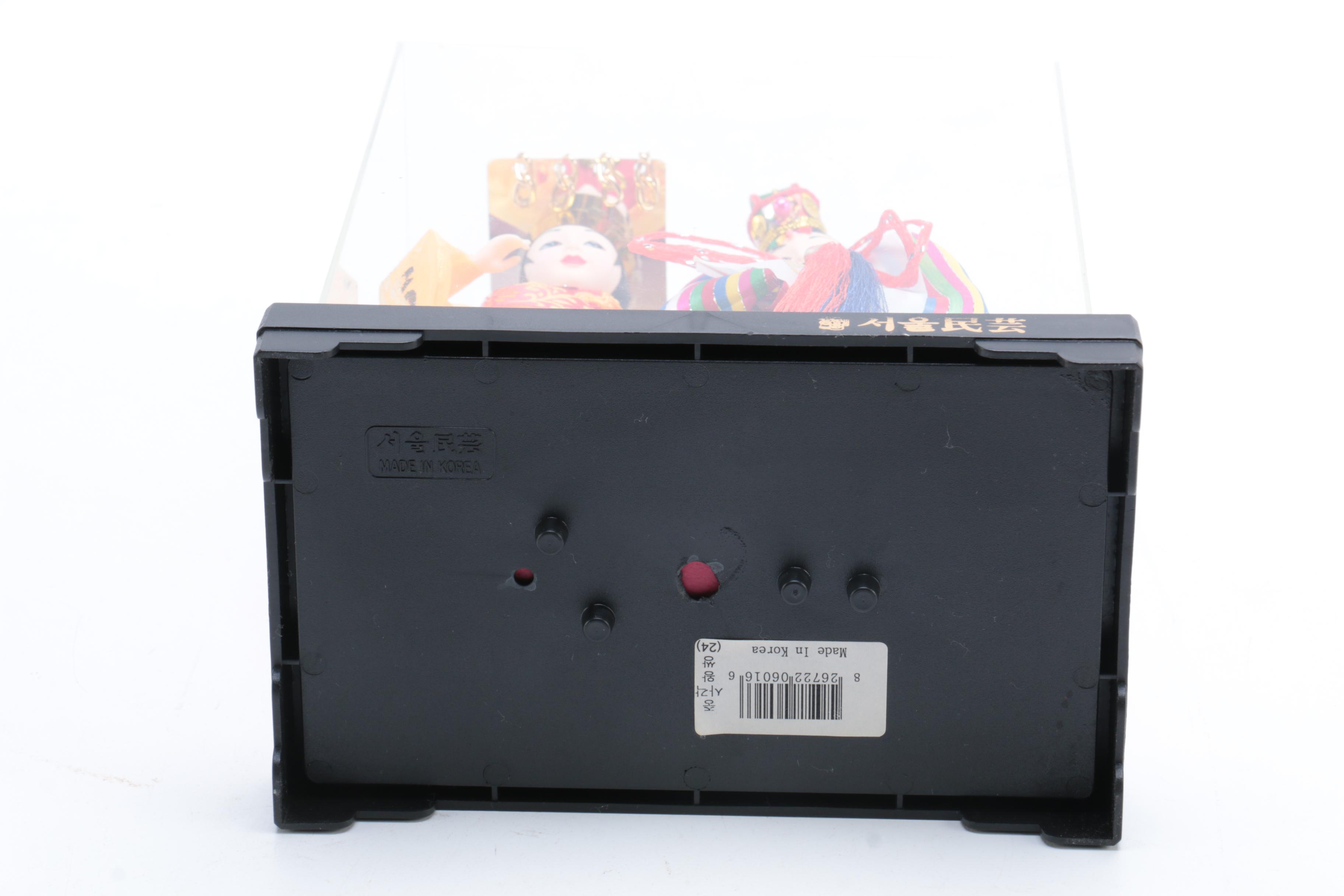 Collection of Four Asian Dolls