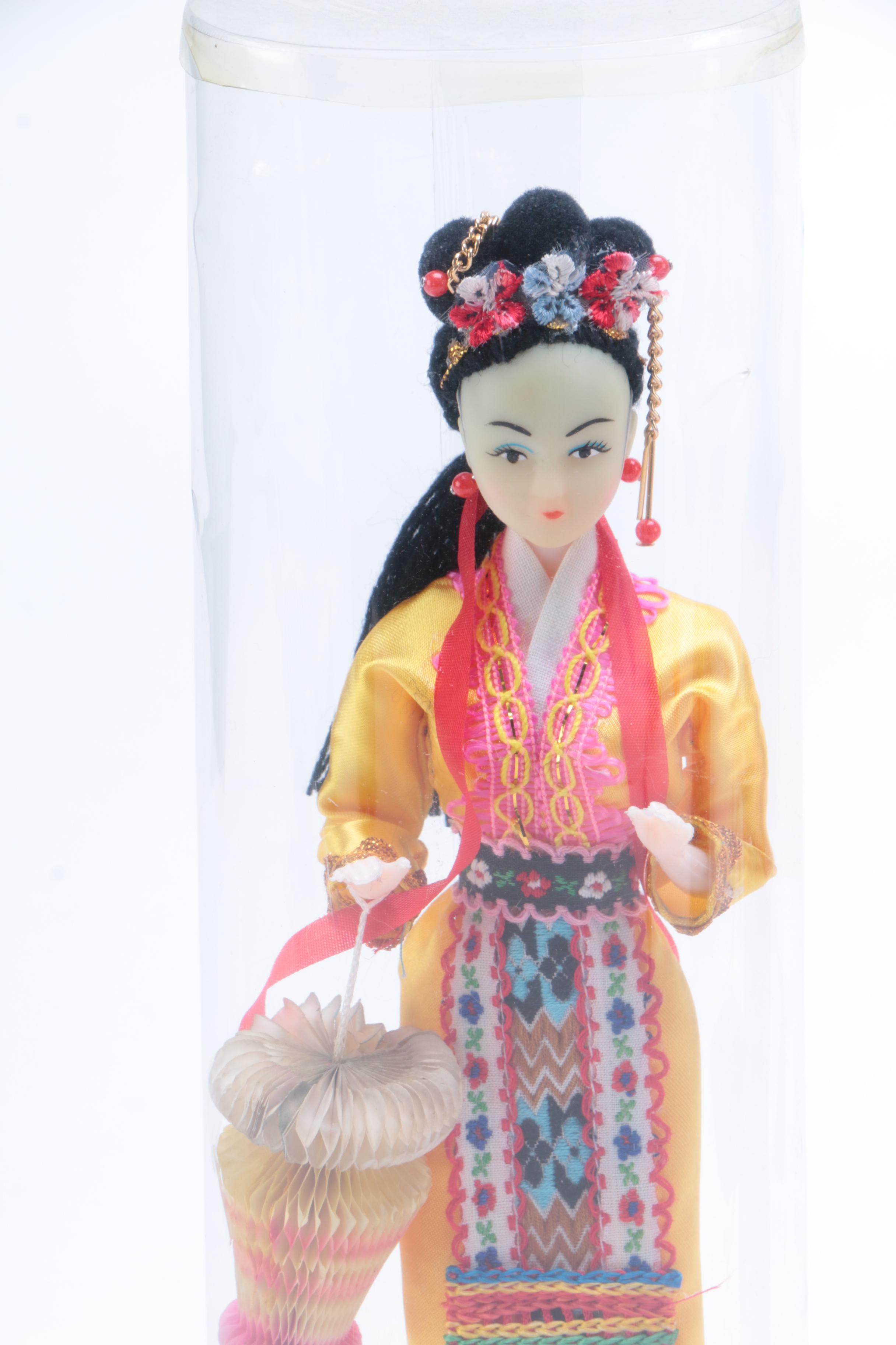 Collection of Four Asian Dolls
