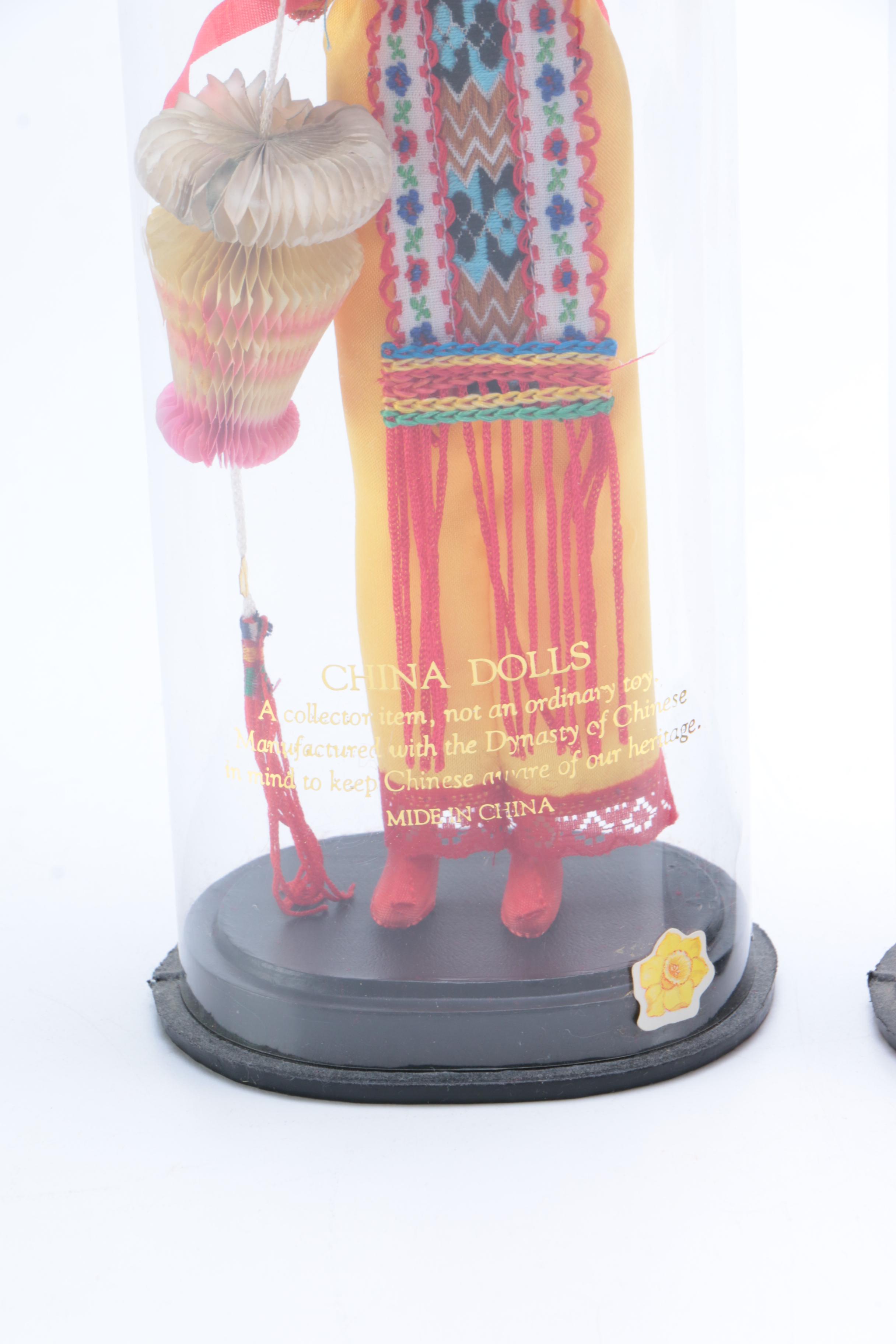 Collection of Four Asian Dolls