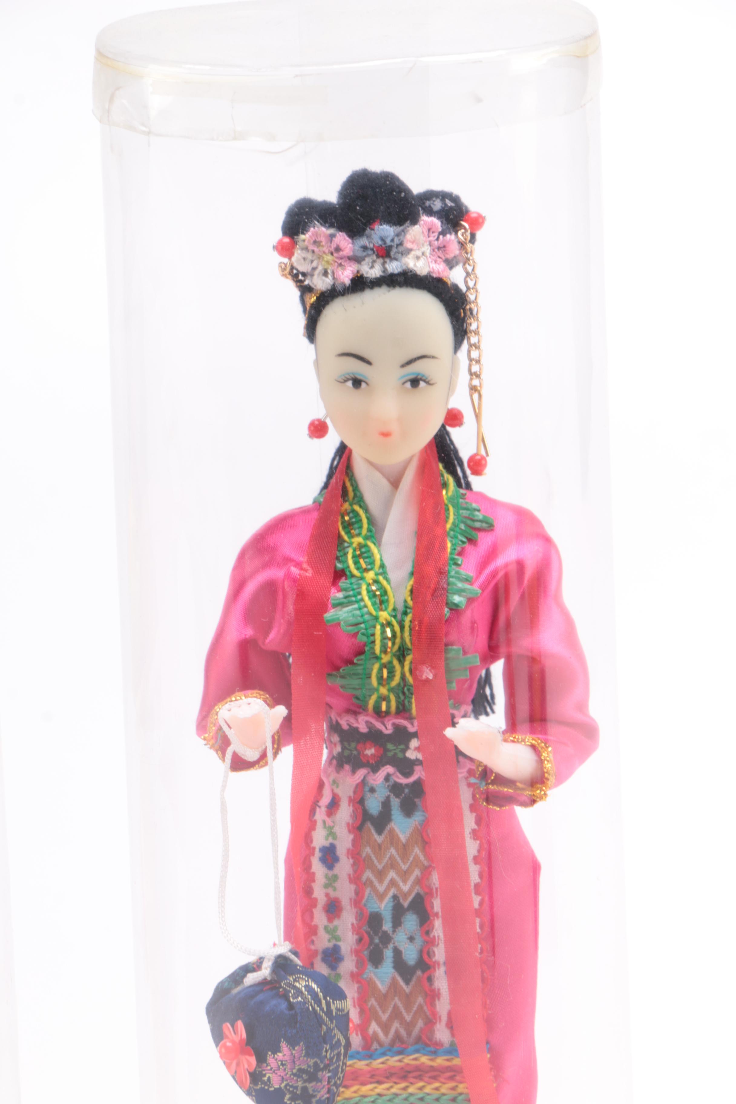 Collection of Four Asian Dolls