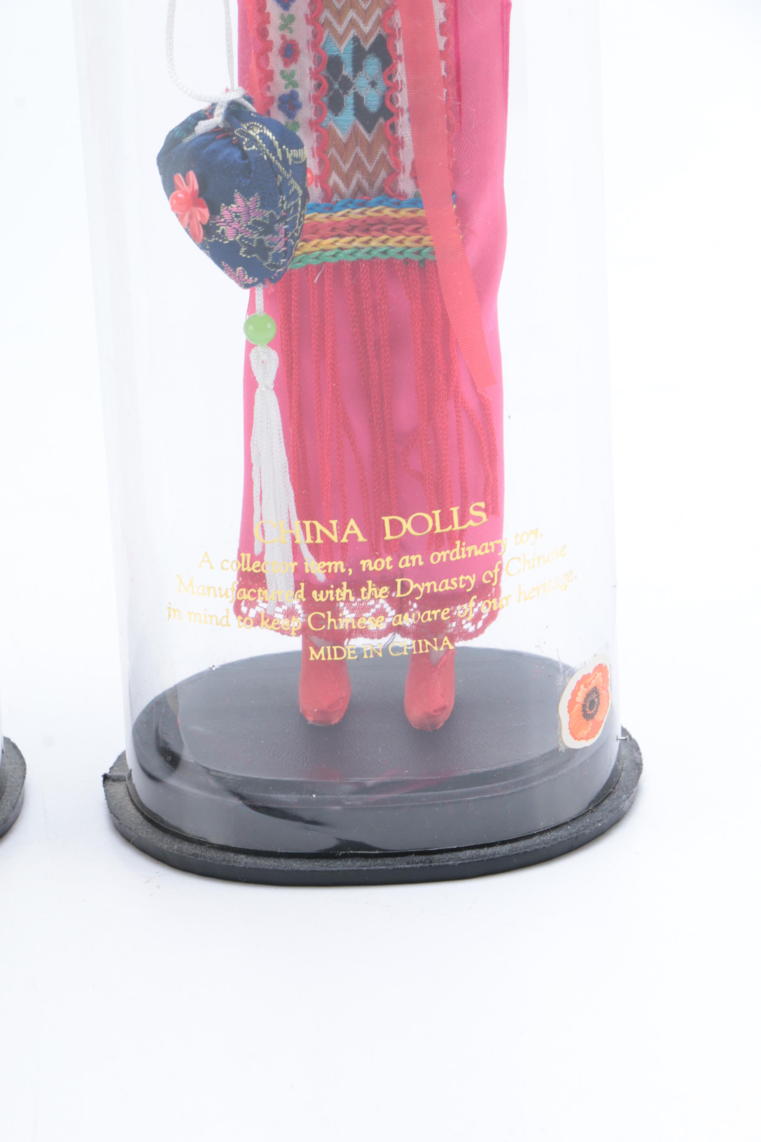 Collection of Four Asian Dolls