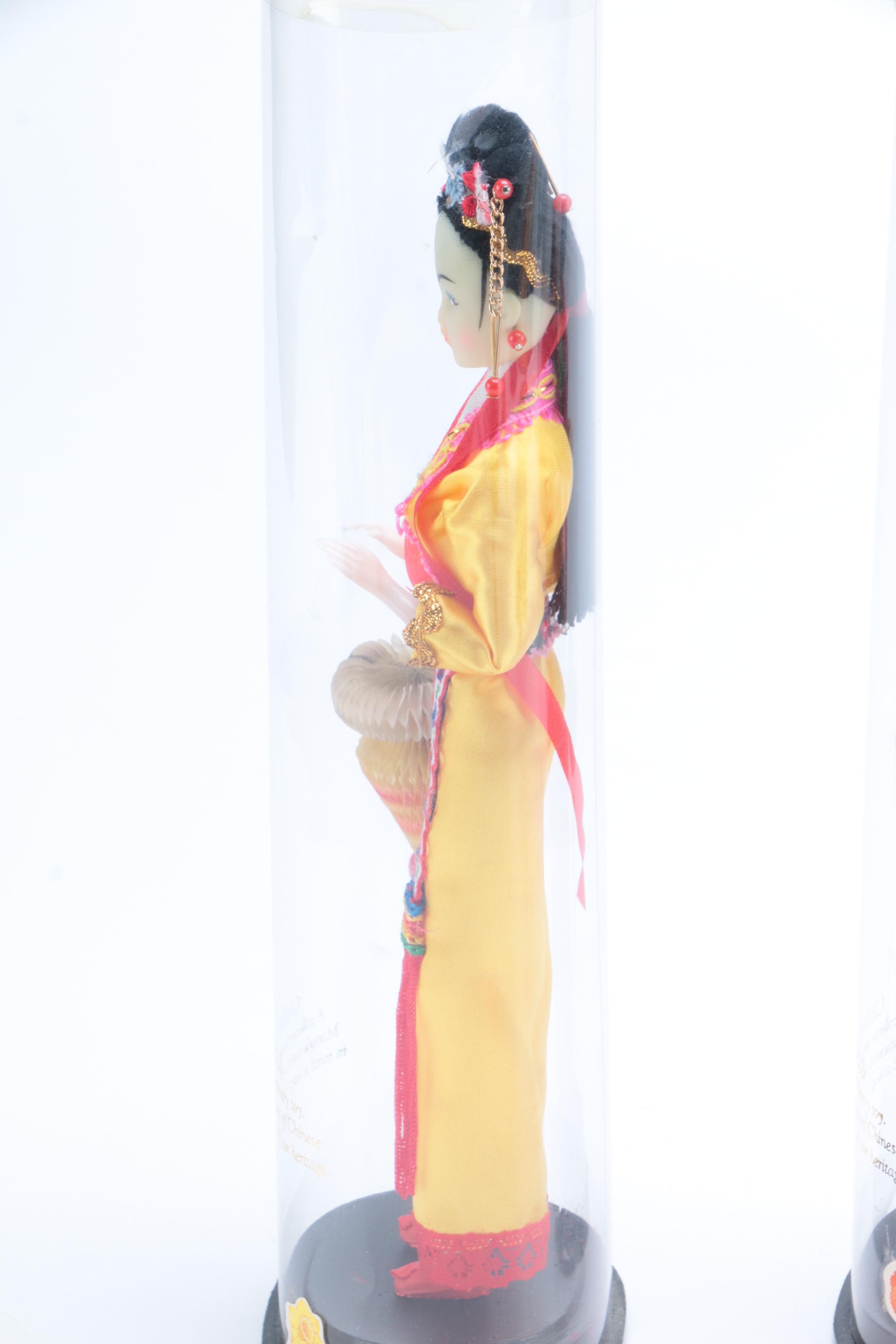 Collection of Four Asian Dolls