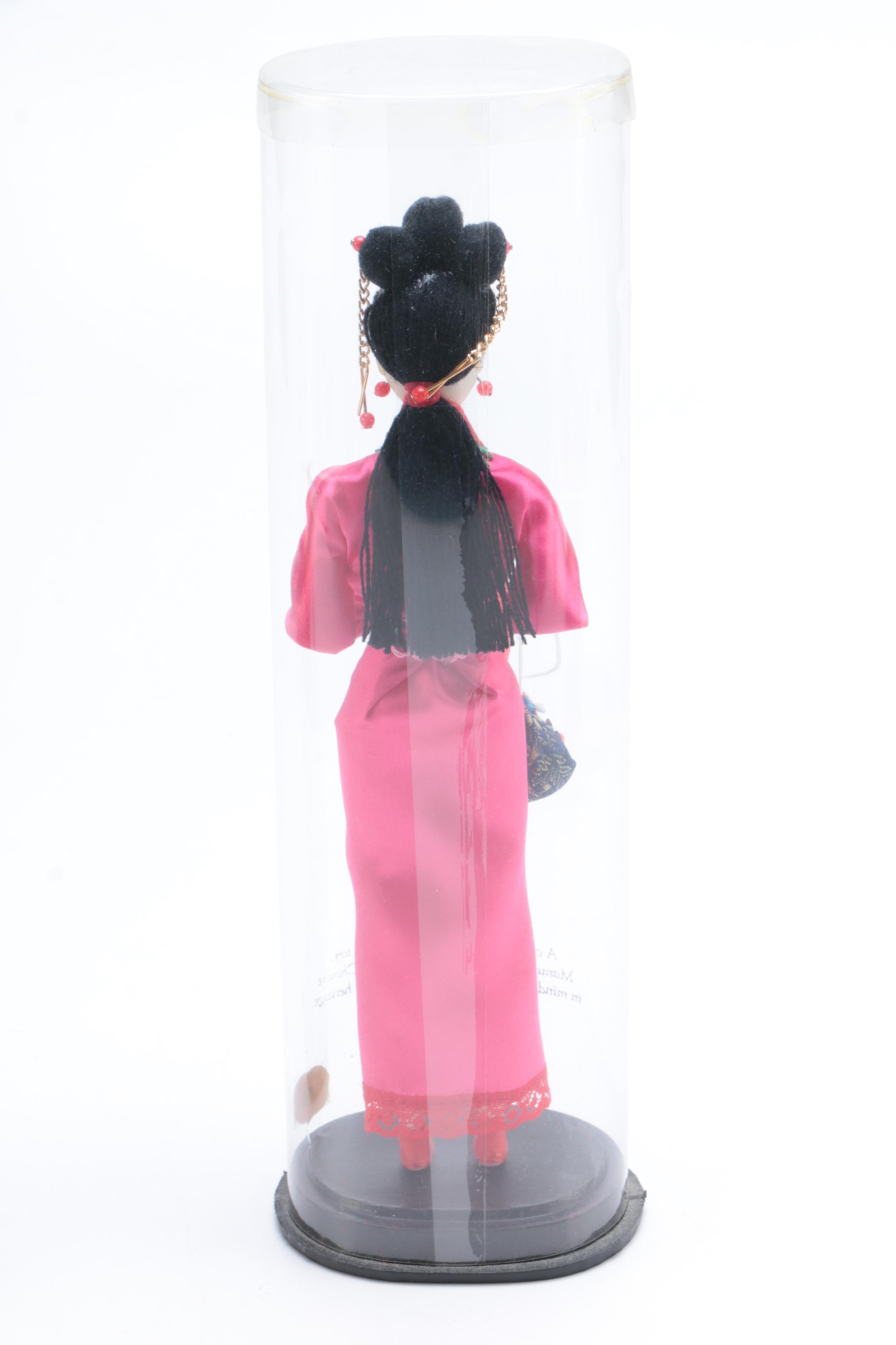 Collection of Four Asian Dolls