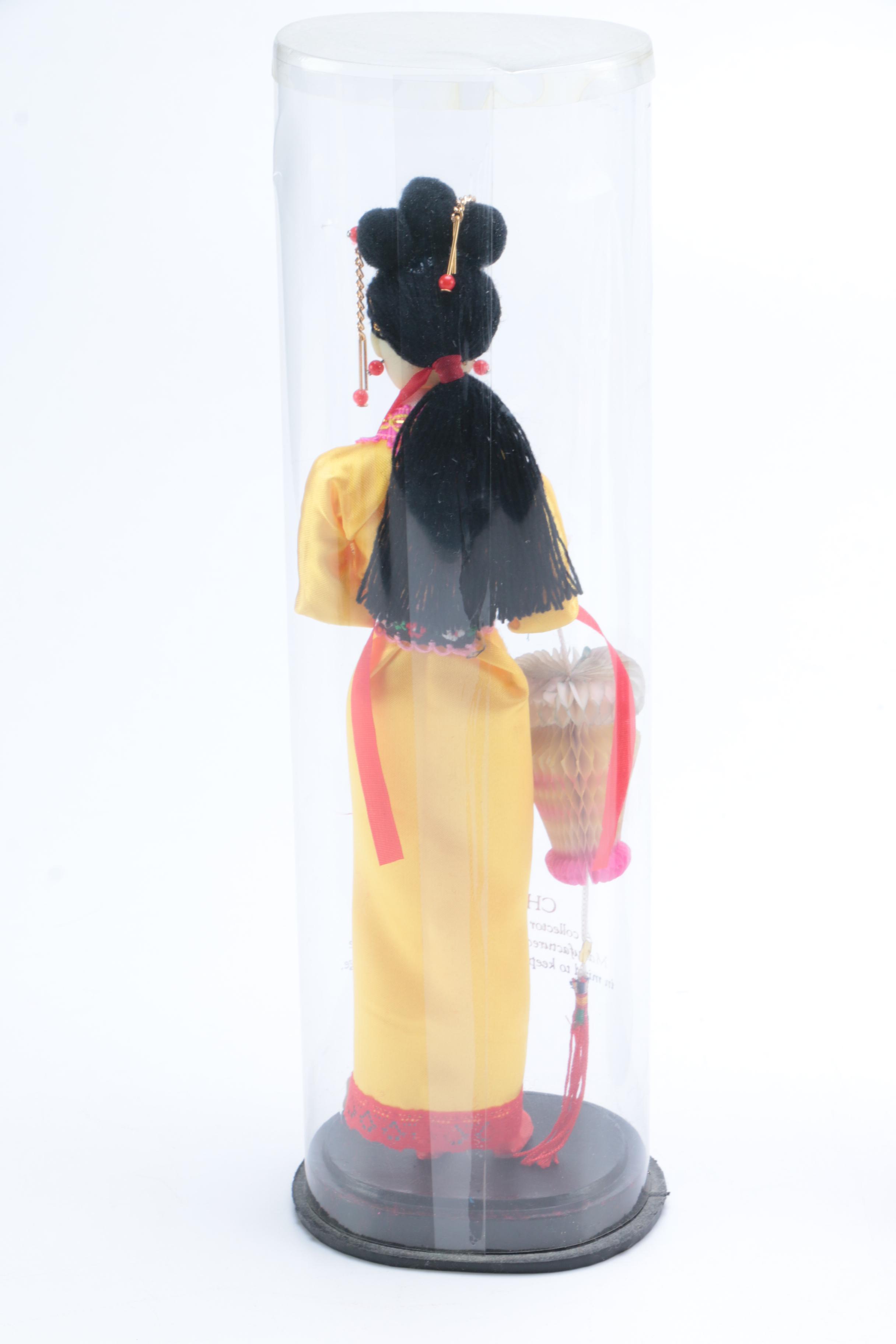 Collection of Four Asian Dolls