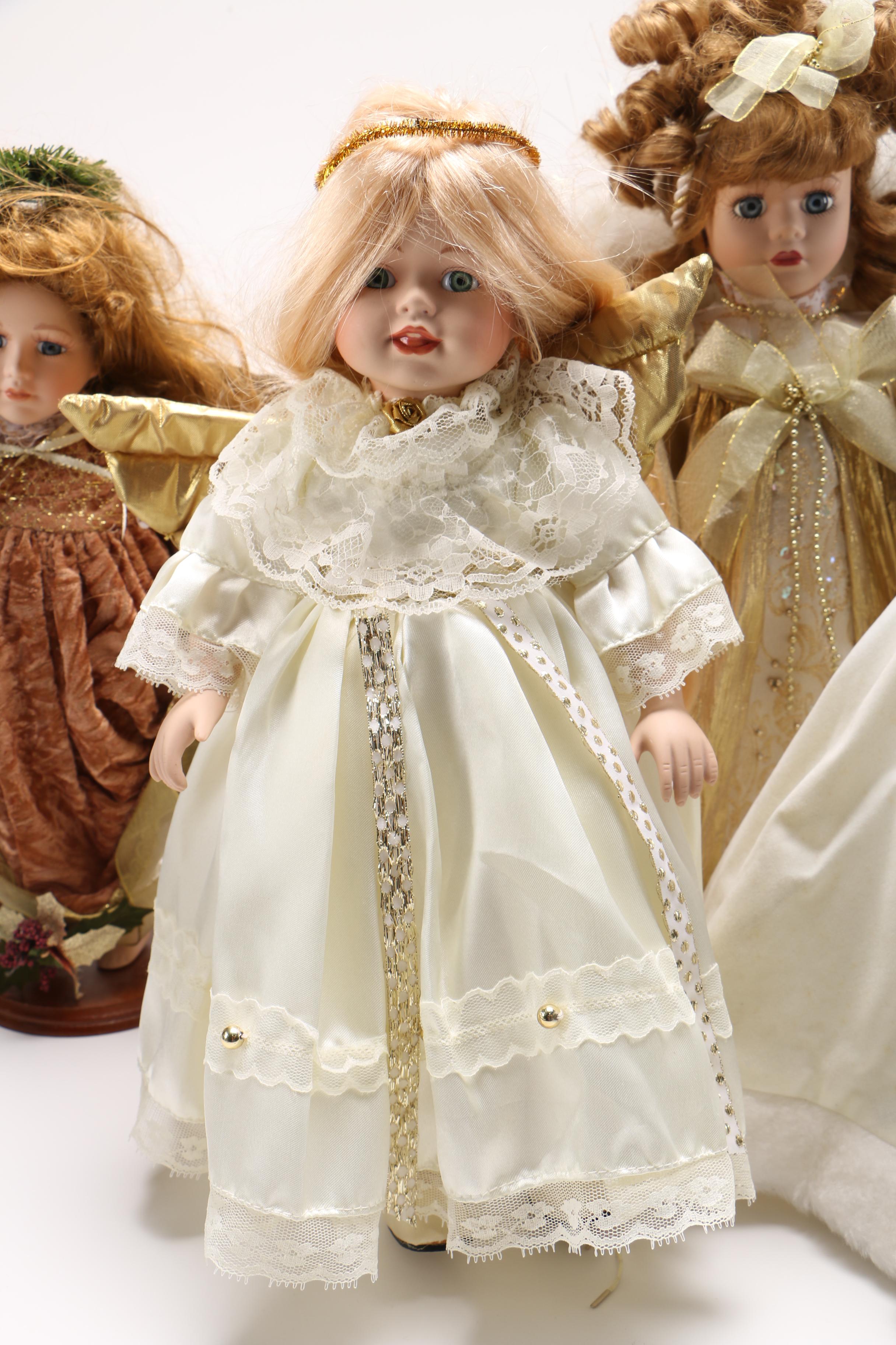 Collection of Winter Themed Porcelain Dolls
