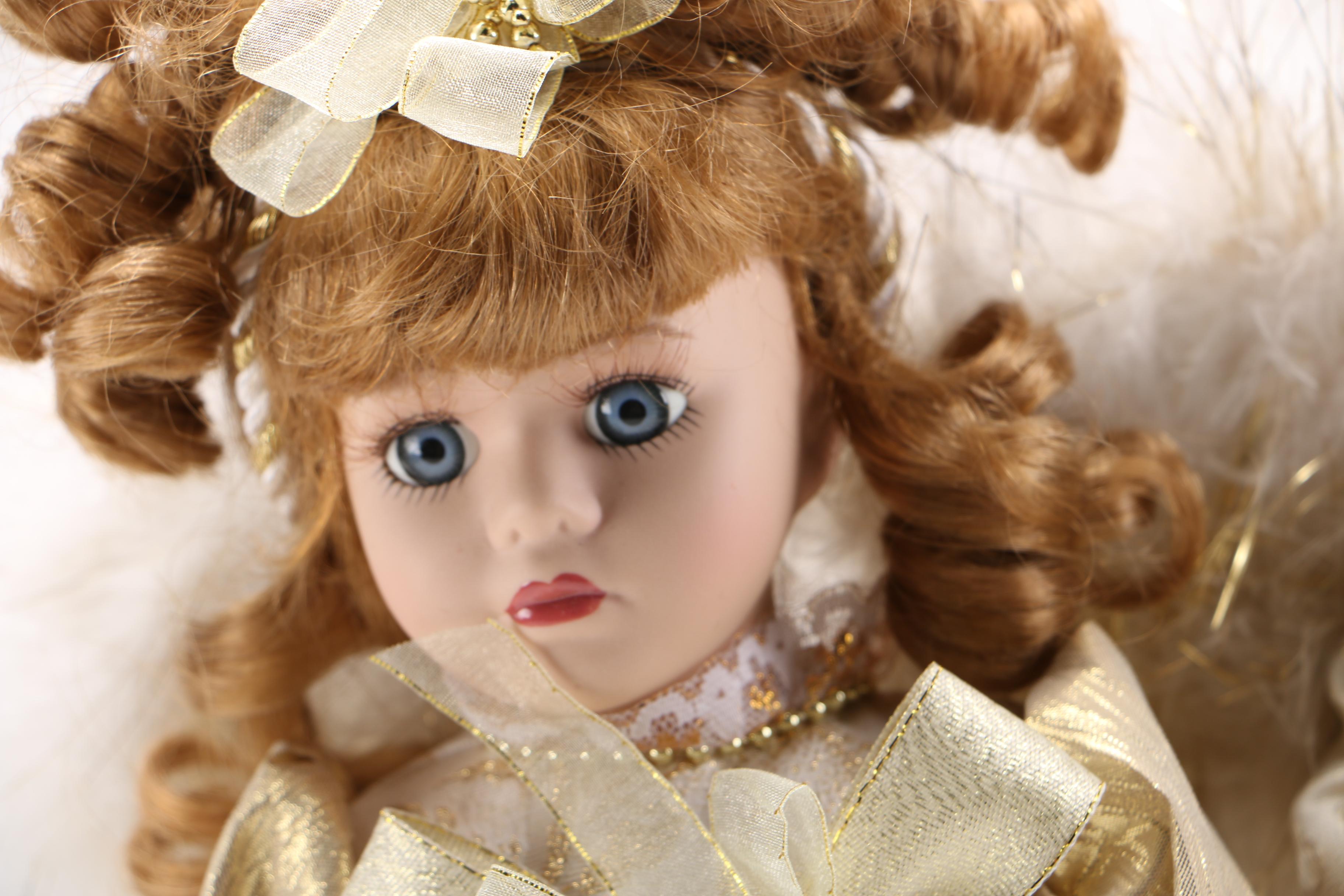 Collection of Winter Themed Porcelain Dolls
