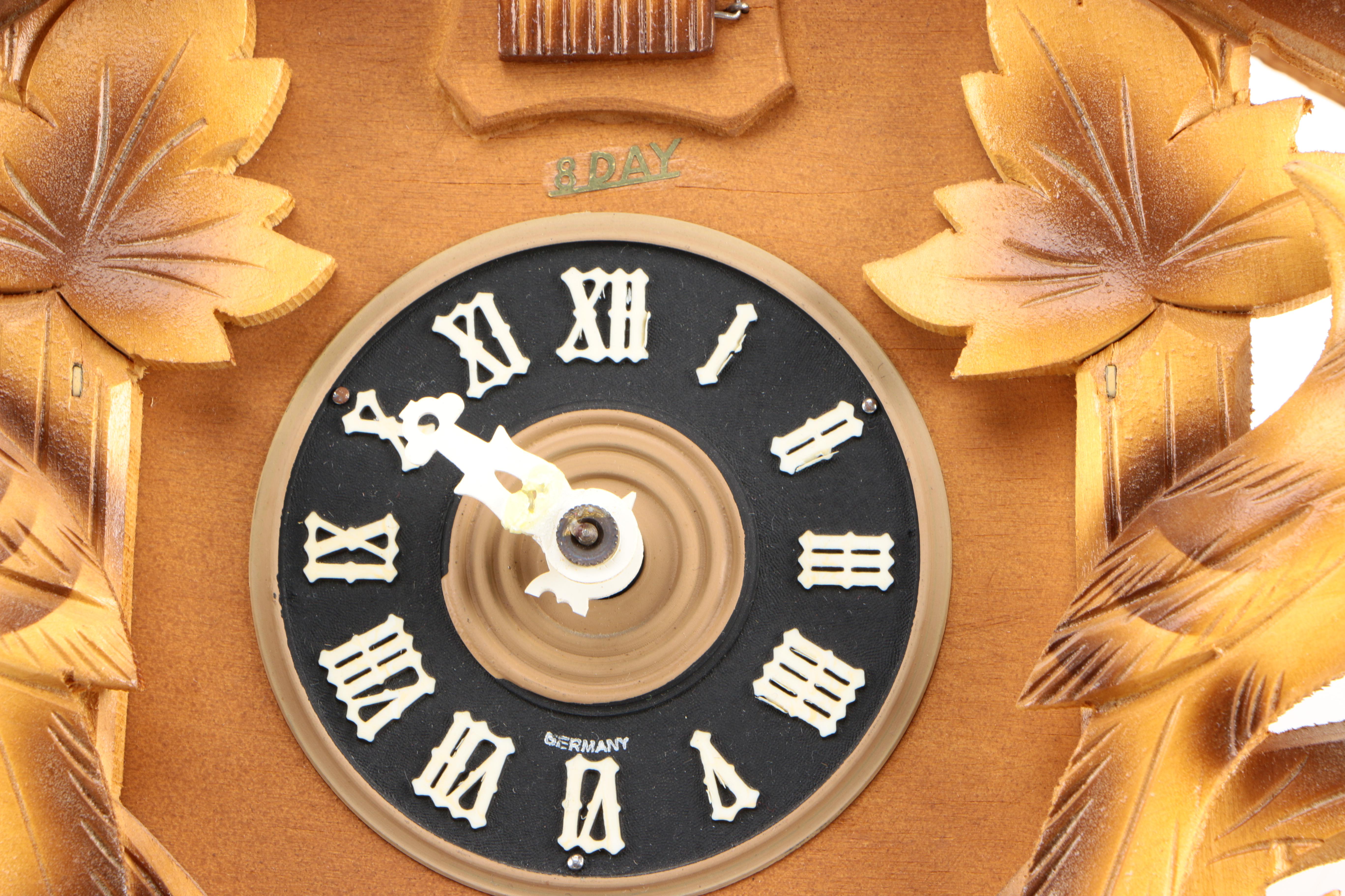 Carved Wooden 8-Day Cuckoo Clock