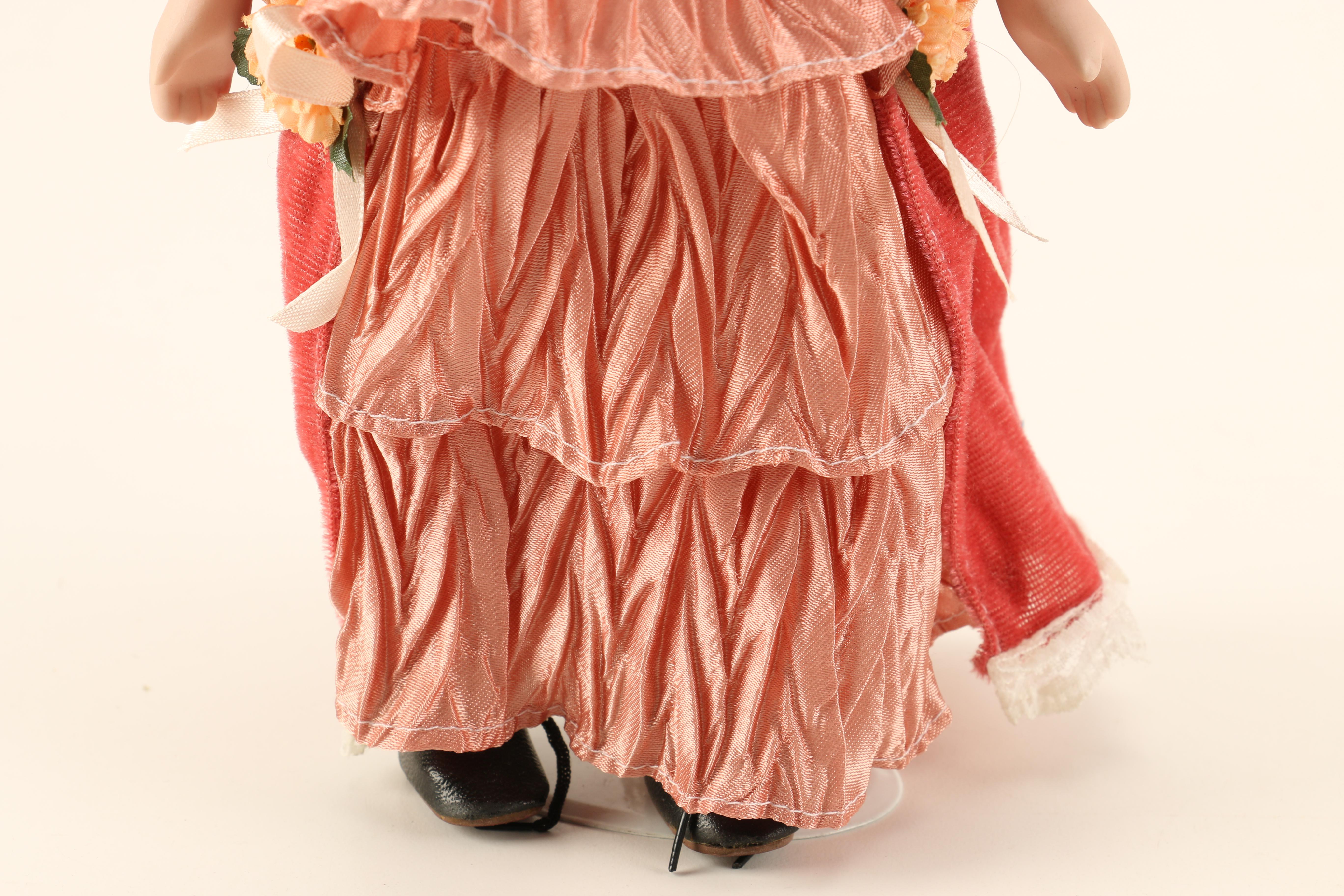 Assortment of Porcelain Dolls