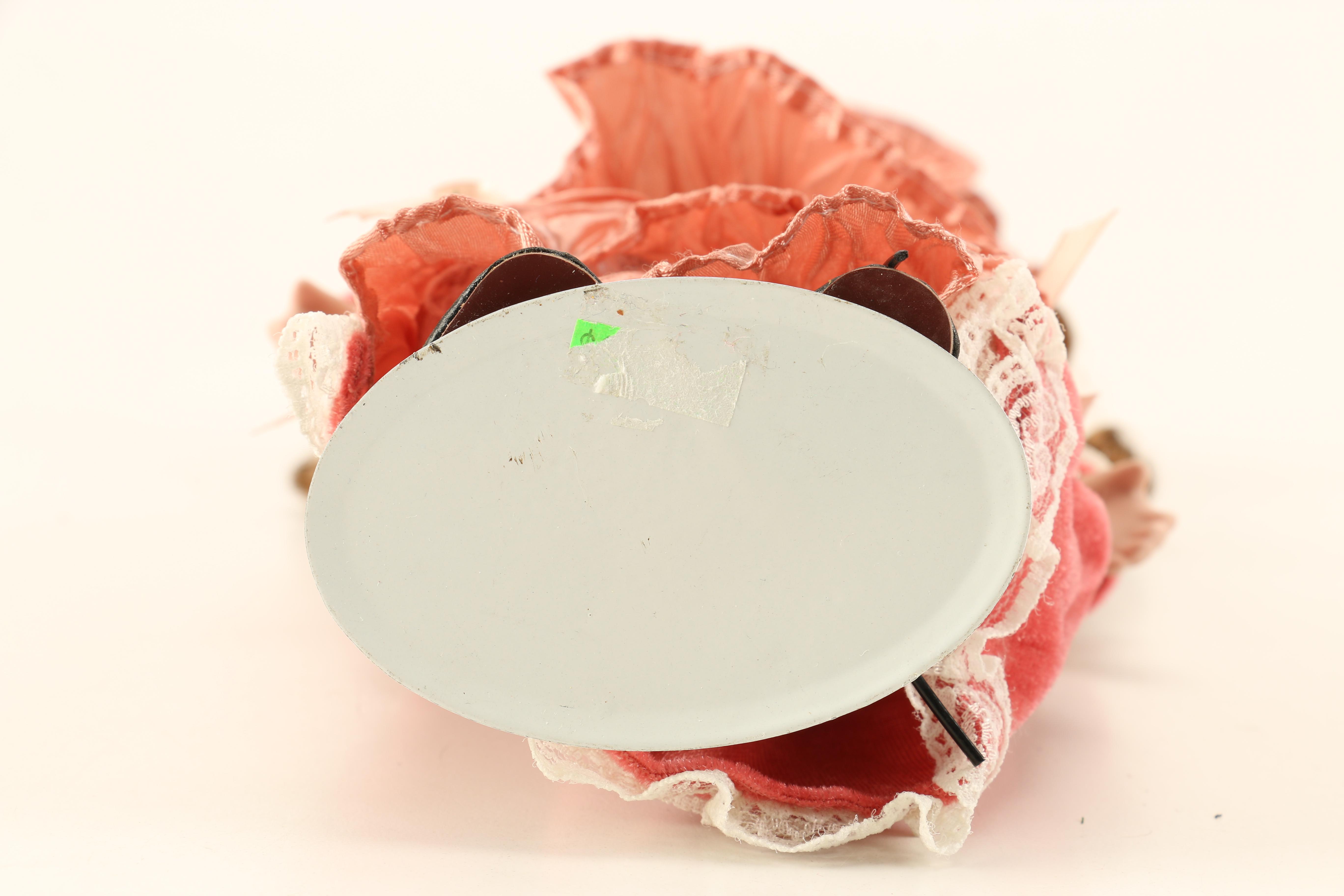 Assortment of Porcelain Dolls