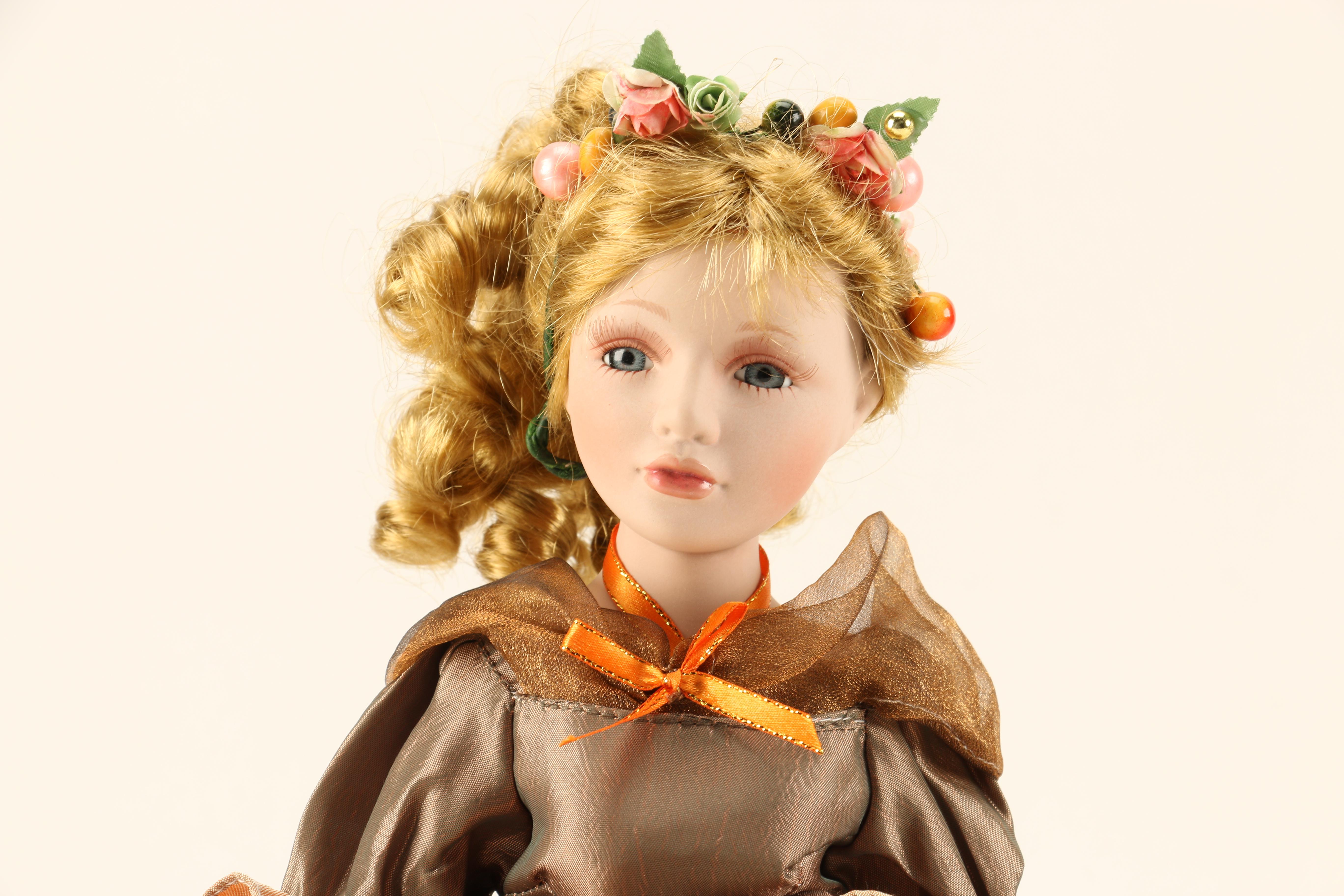 Assortment of Porcelain Dolls