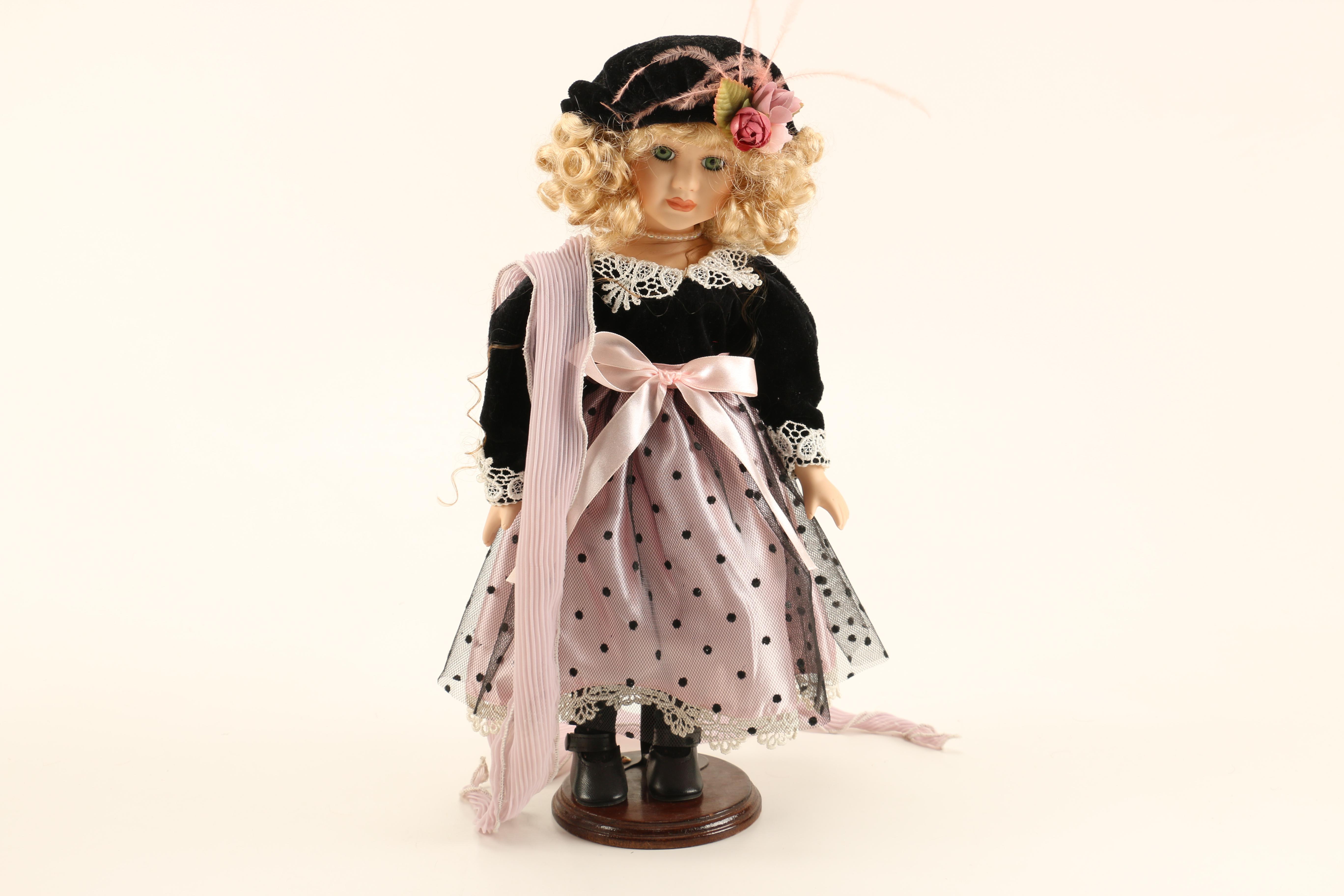 Collection of Four Porcelain Dolls