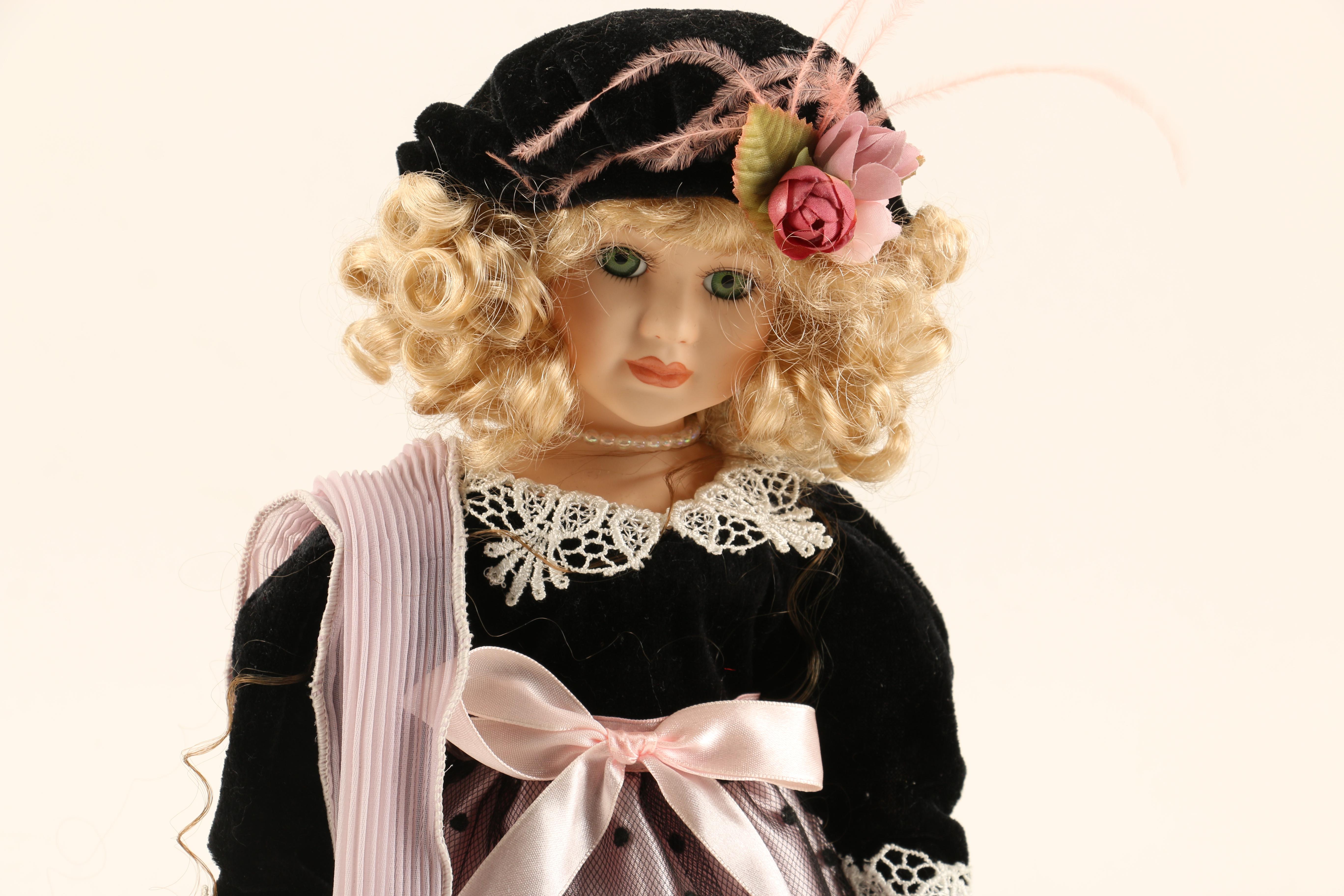 Collection of Four Porcelain Dolls