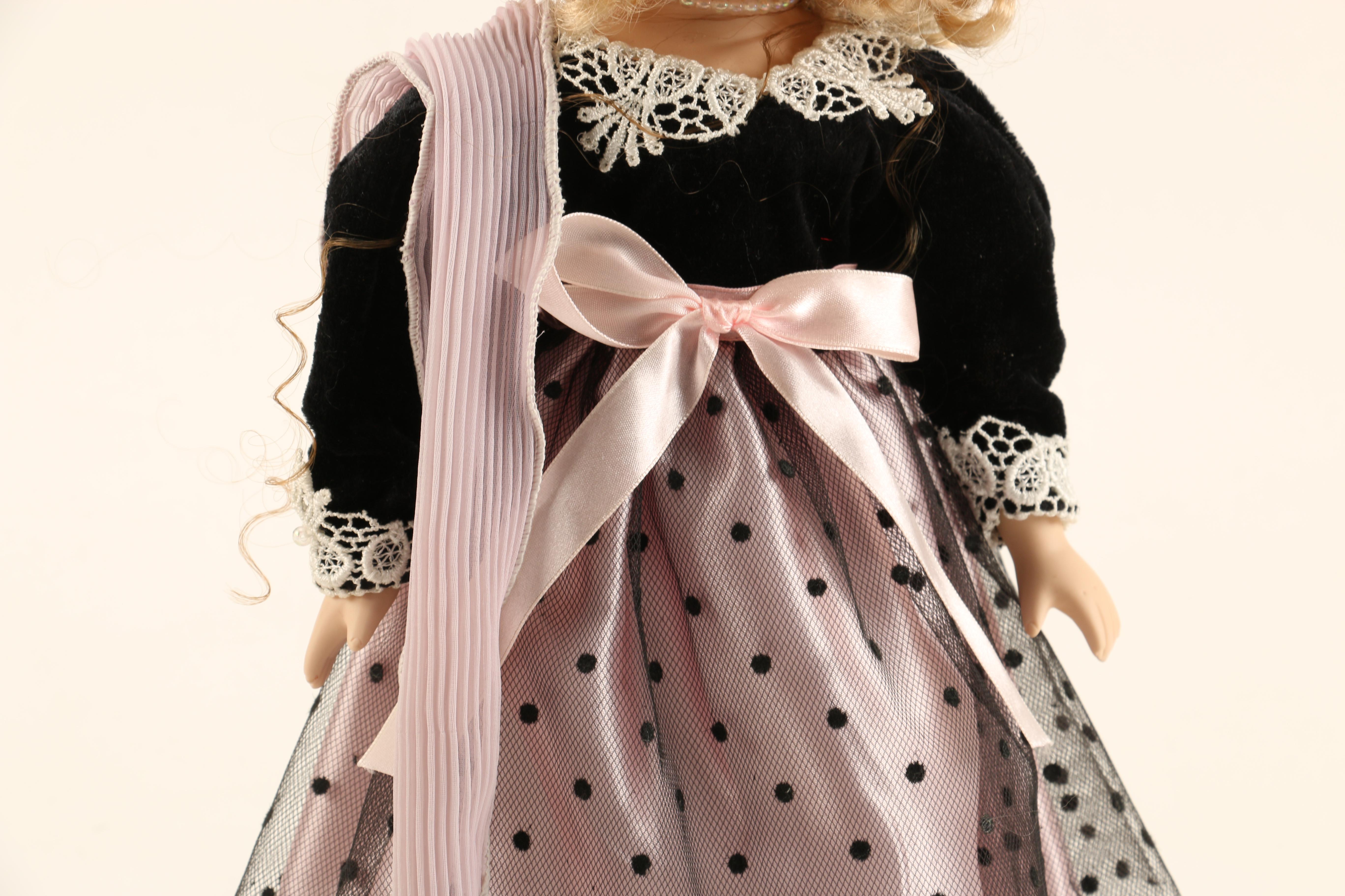 Collection of Four Porcelain Dolls