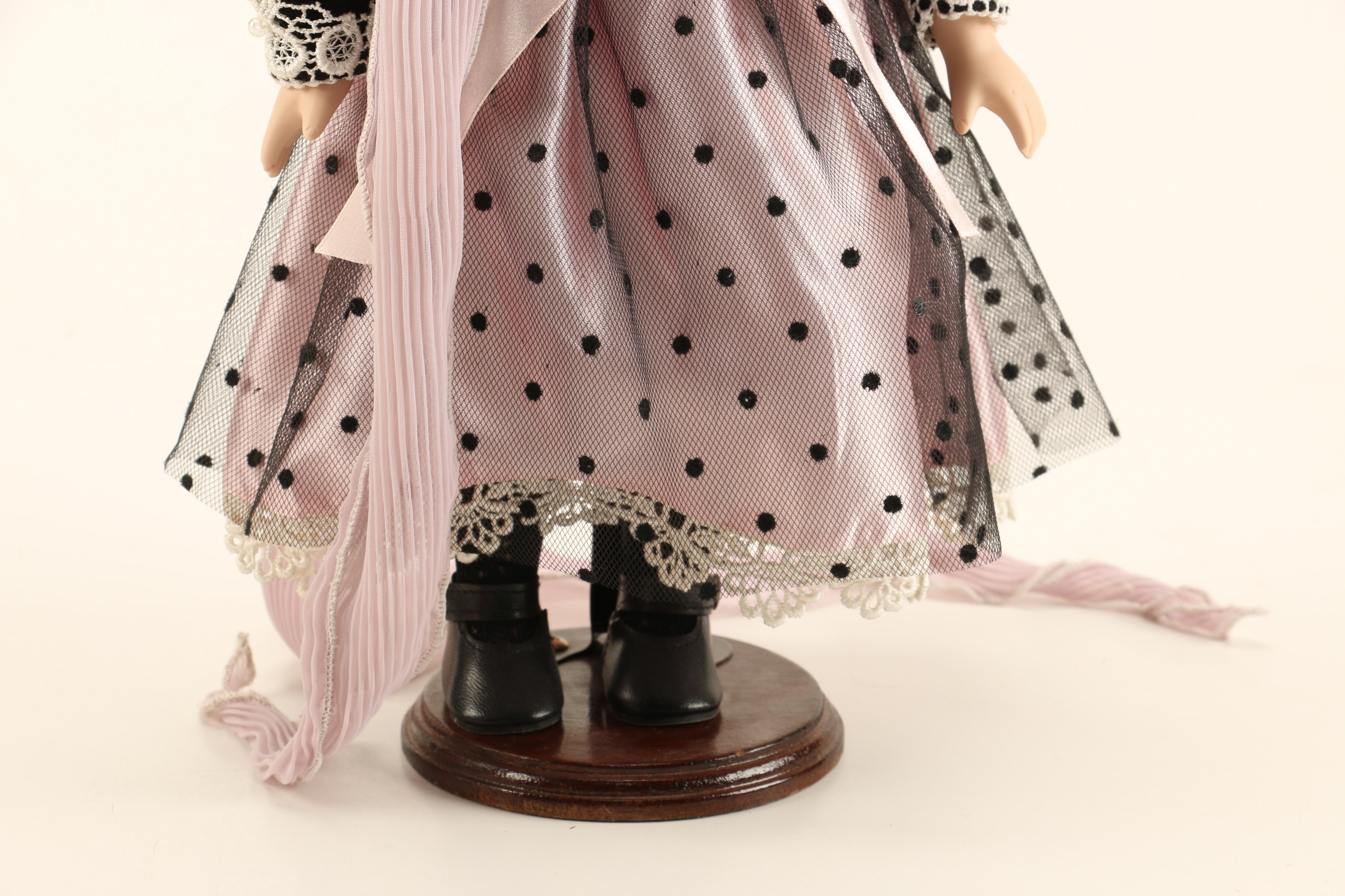 Collection of Four Porcelain Dolls