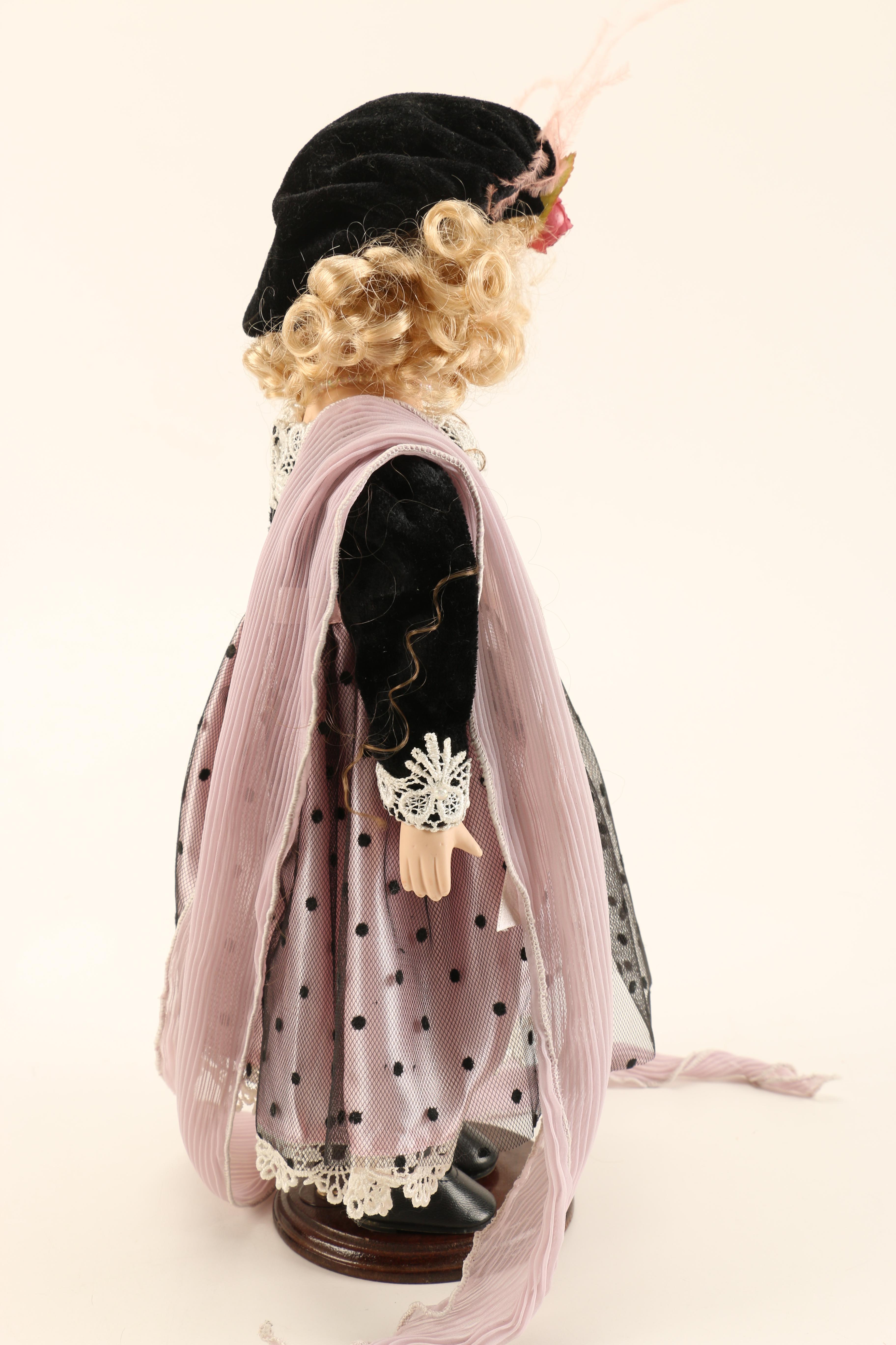 Collection of Four Porcelain Dolls