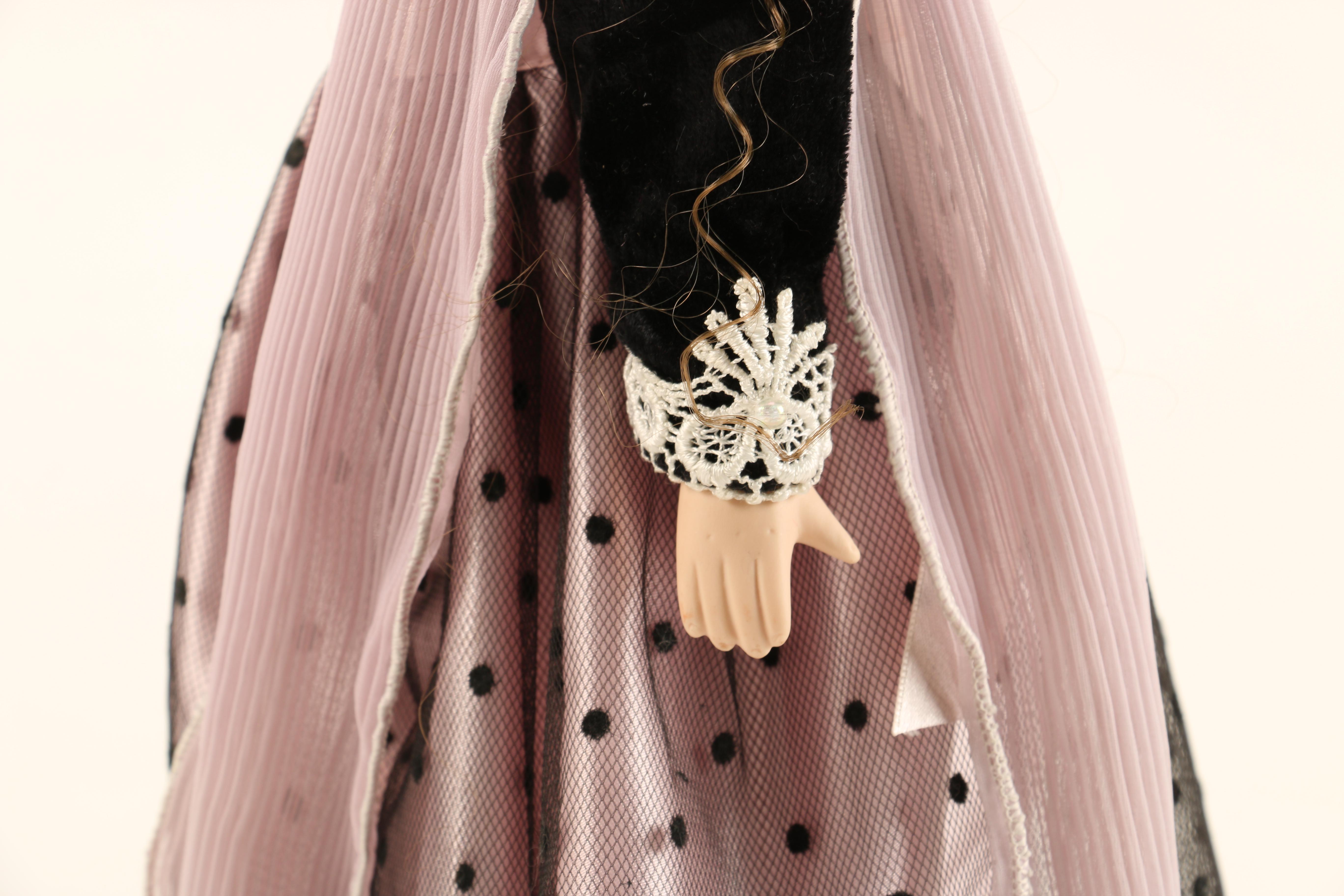 Collection of Four Porcelain Dolls