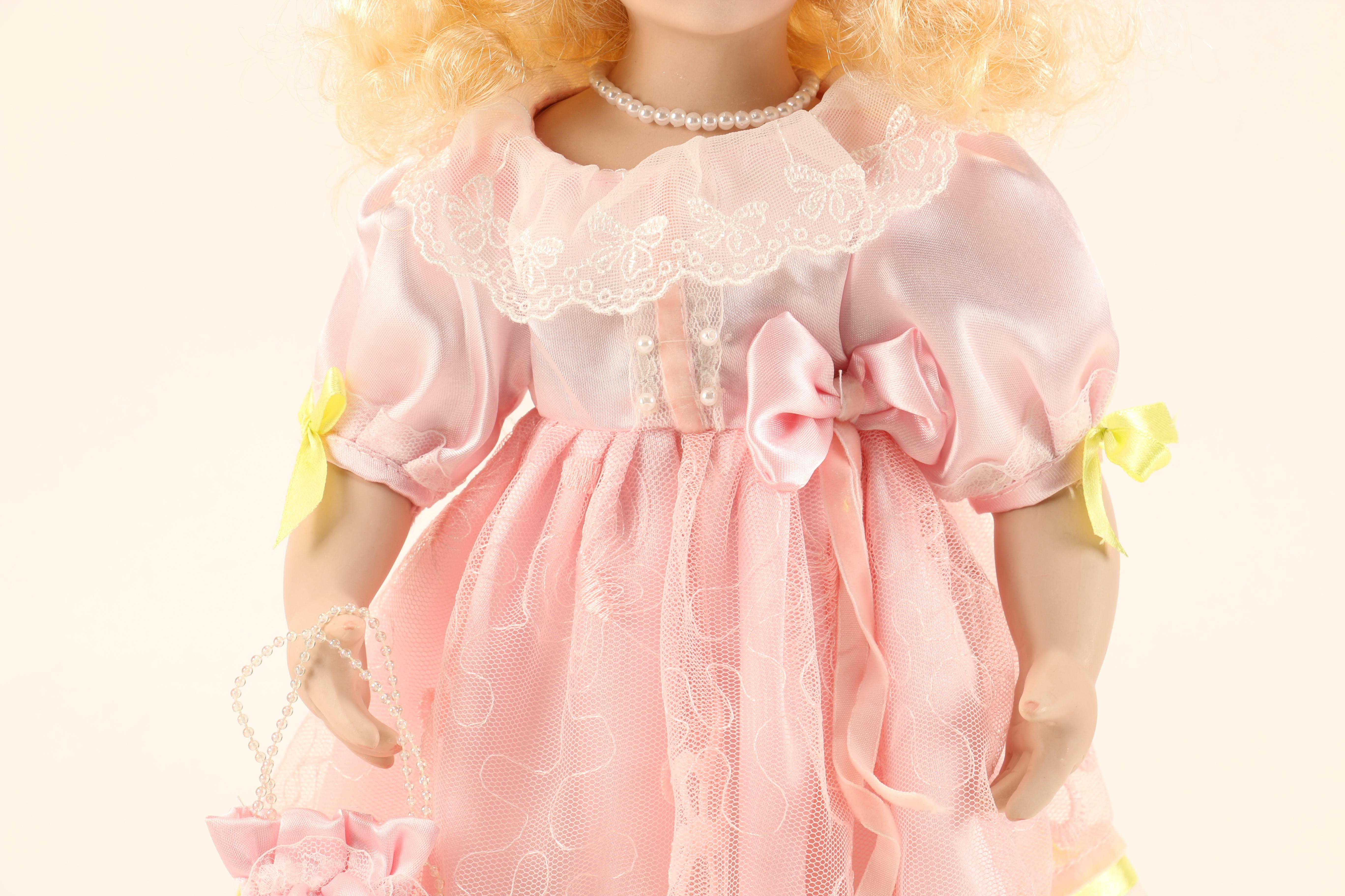 Collection of Four Porcelain Dolls