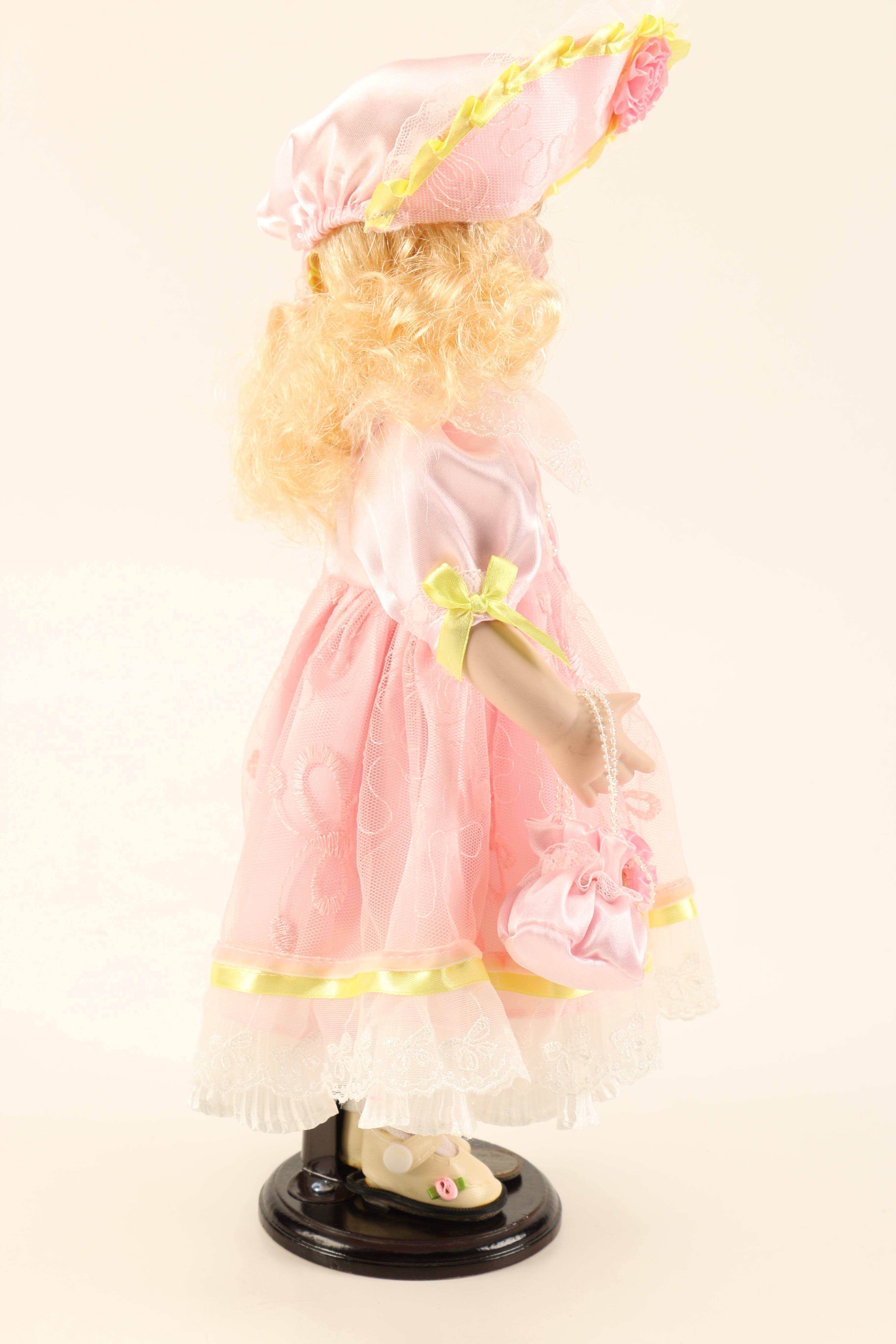 Collection of Four Porcelain Dolls