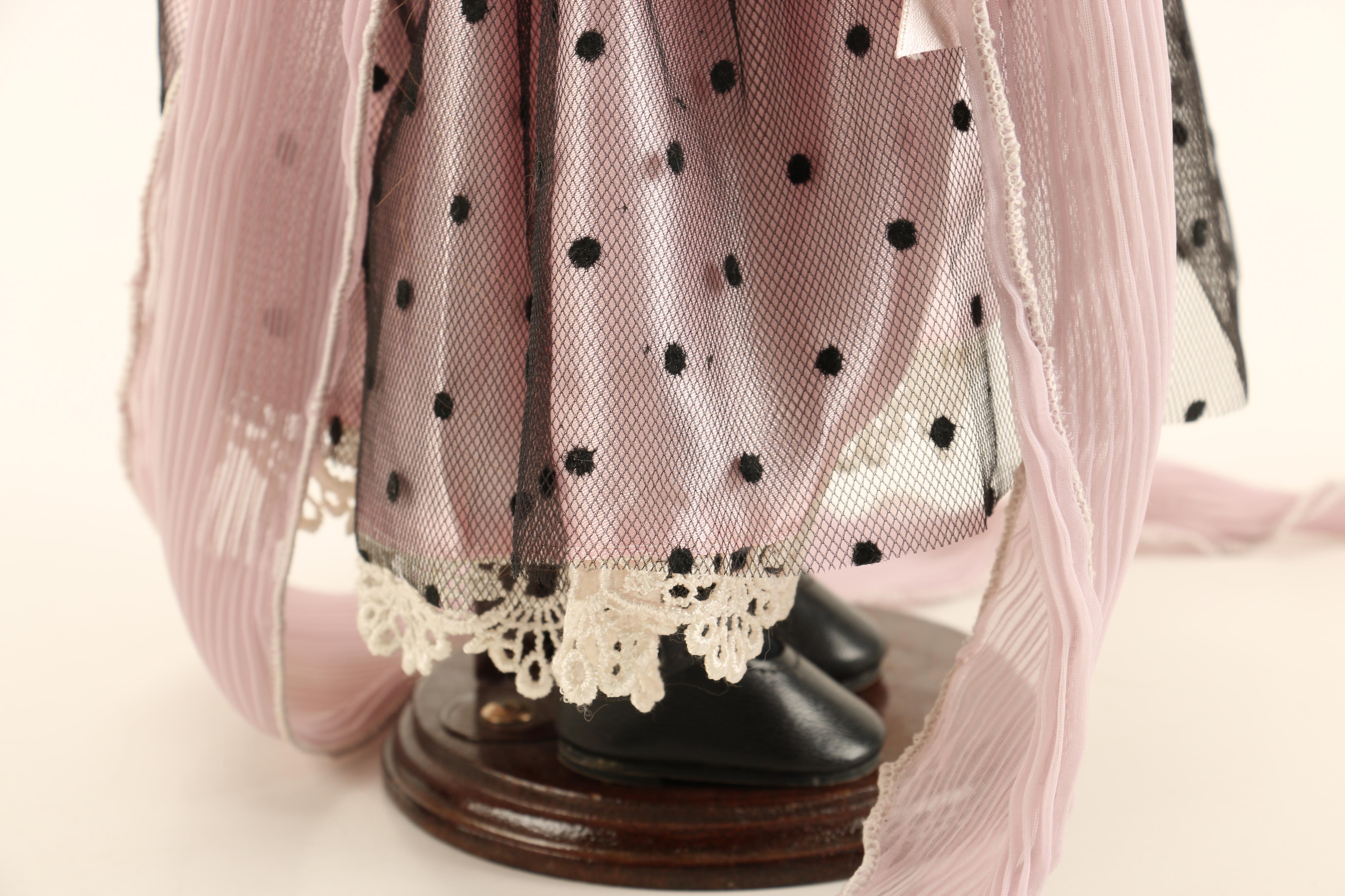 Collection of Four Porcelain Dolls