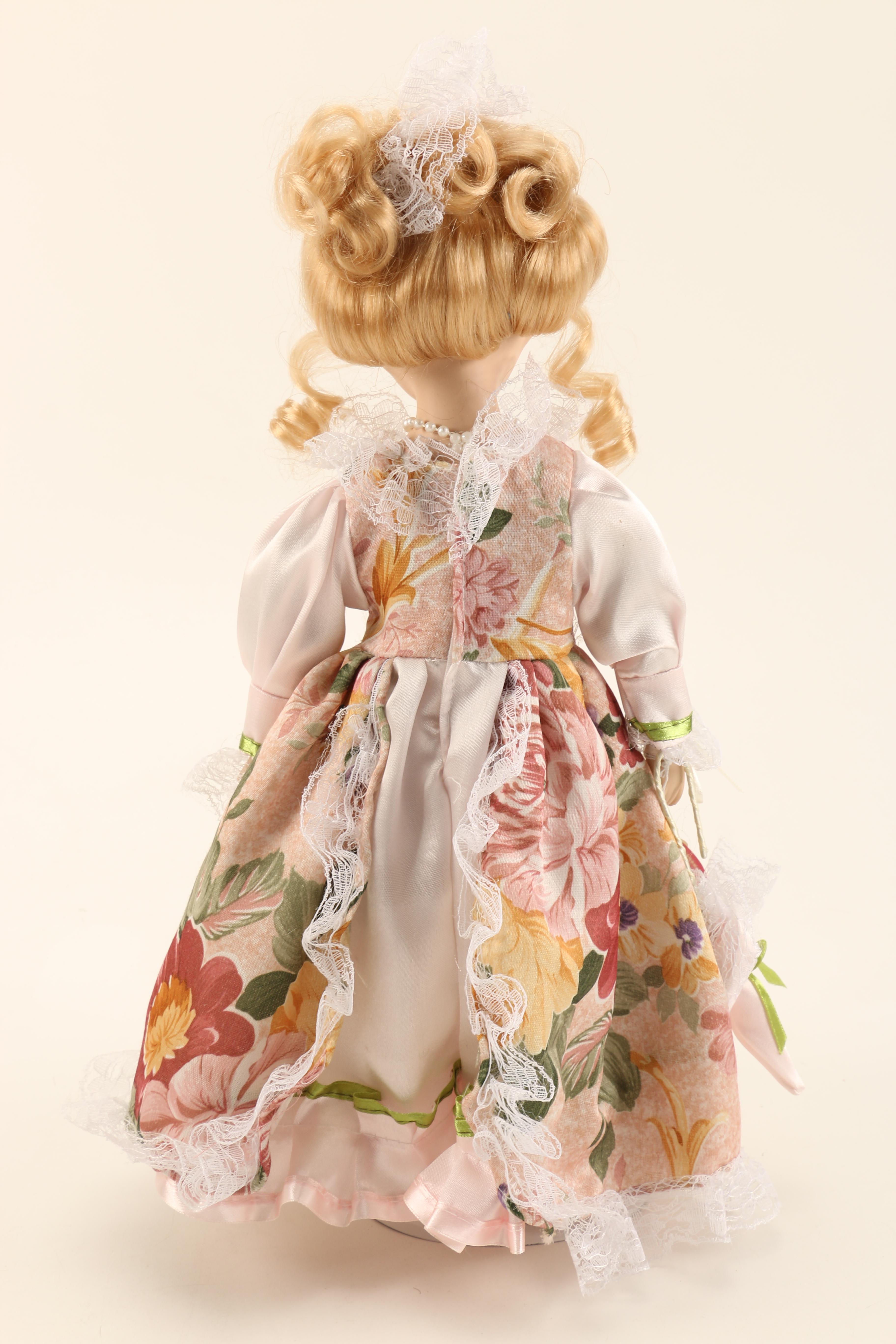Collection of Four Porcelain Dolls